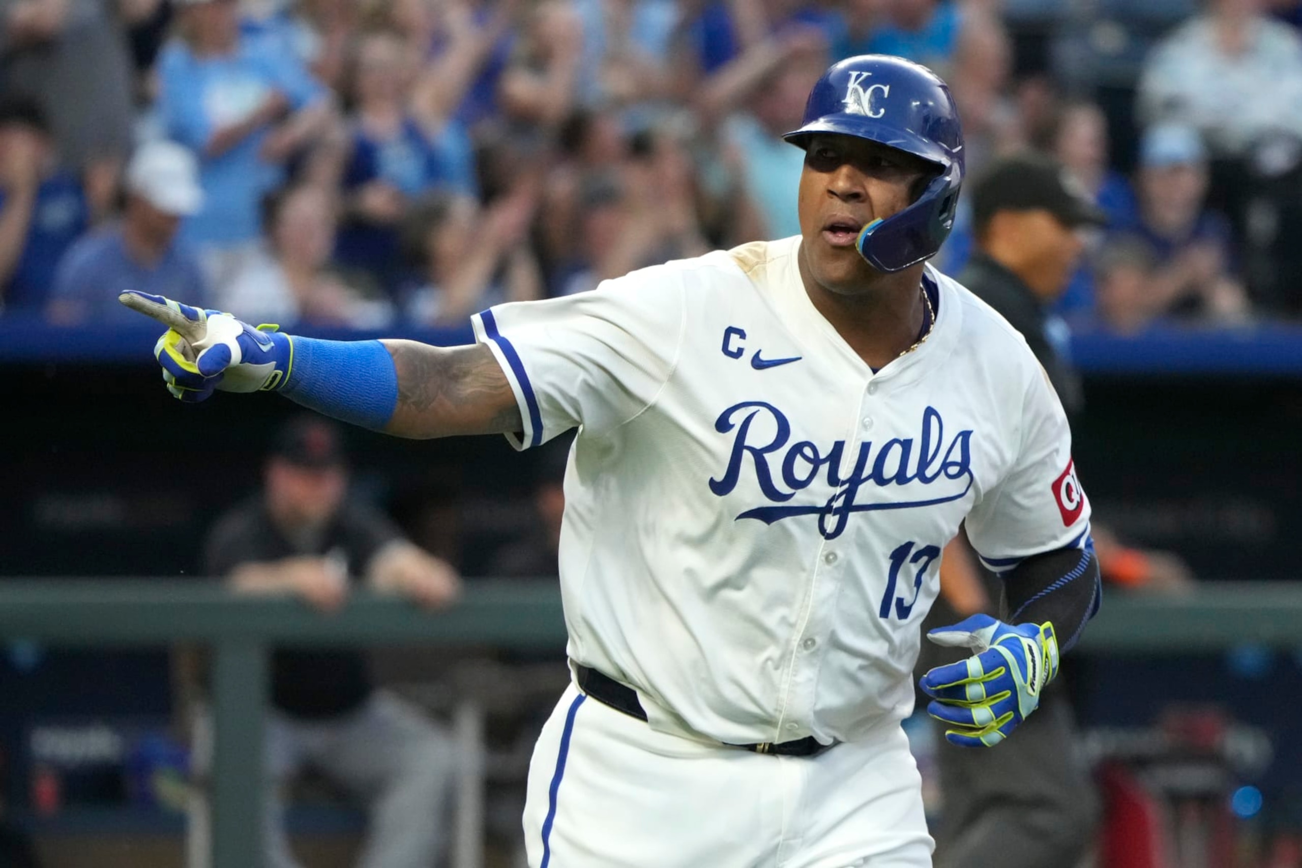 KANSAS CITY, MISSOURI - MAY 20: Salvador Perez #13 of the Kansas City Royals points to teammates as he celebrates his home run in the sixth inning against the Detroit Tigers at Kauffman Stadium on May 20, 2024 in Kansas City, Missouri. (Photo by Ed Zurga/Getty Images)