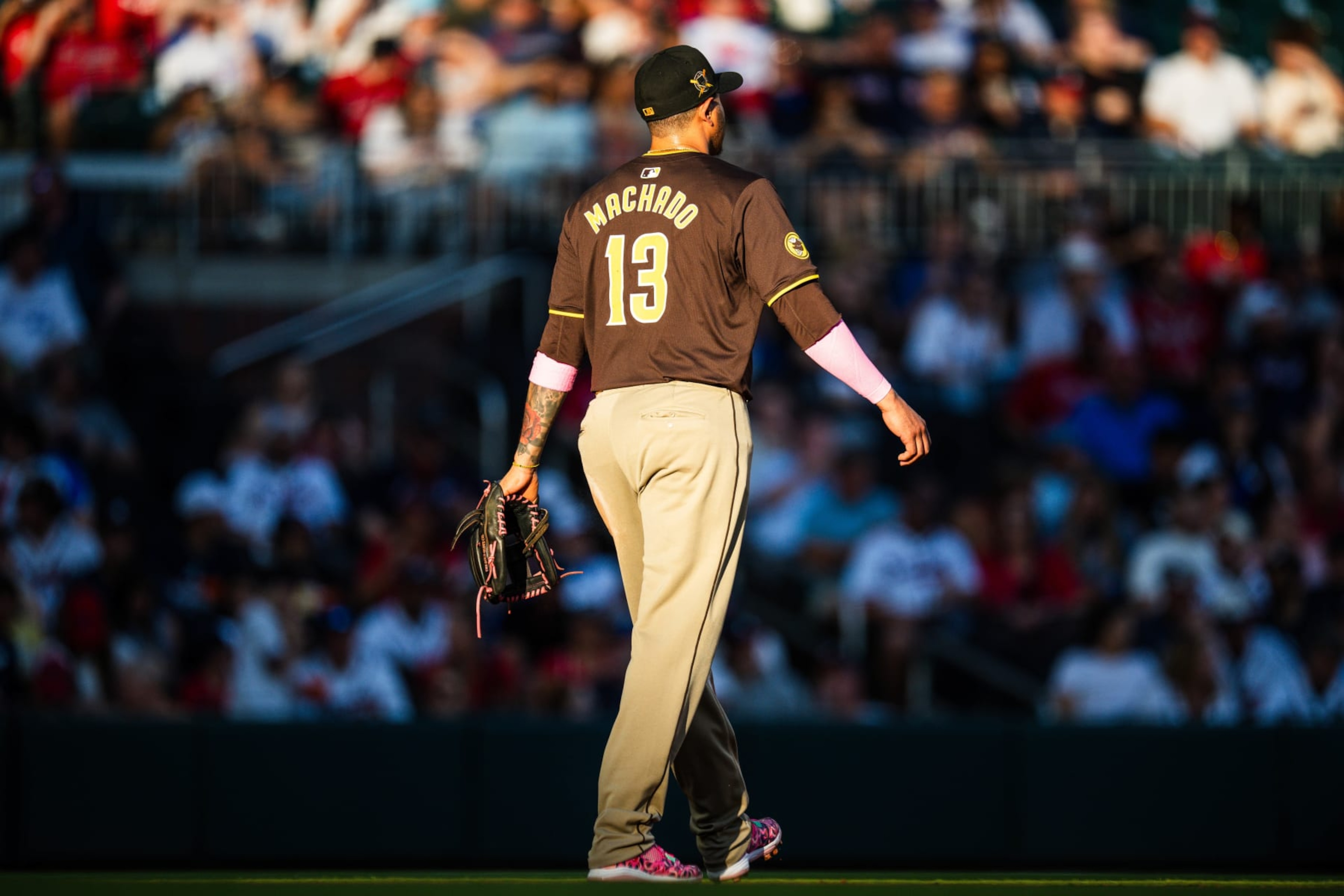 ATLANTA, GA - MAY 19: Manny Machado #13 of the San Diego Padres stands on the field during the first inning against the Atlanta Braves at Truist Park on May 19, 2024 in Atlanta, Georgia. (Photo by Kevin D. Liles/Atlanta Braves/Getty Images) ATLANTA, GA - MAY 19: Manny Machado #13 of the San Diego Padres stands on the field during the first inning against the Atlanta Braves at Truist Park on May 19, 2024 in Atlanta, Georgia. (Photo by Kevin D. Liles/Atlanta Braves/Getty Images)