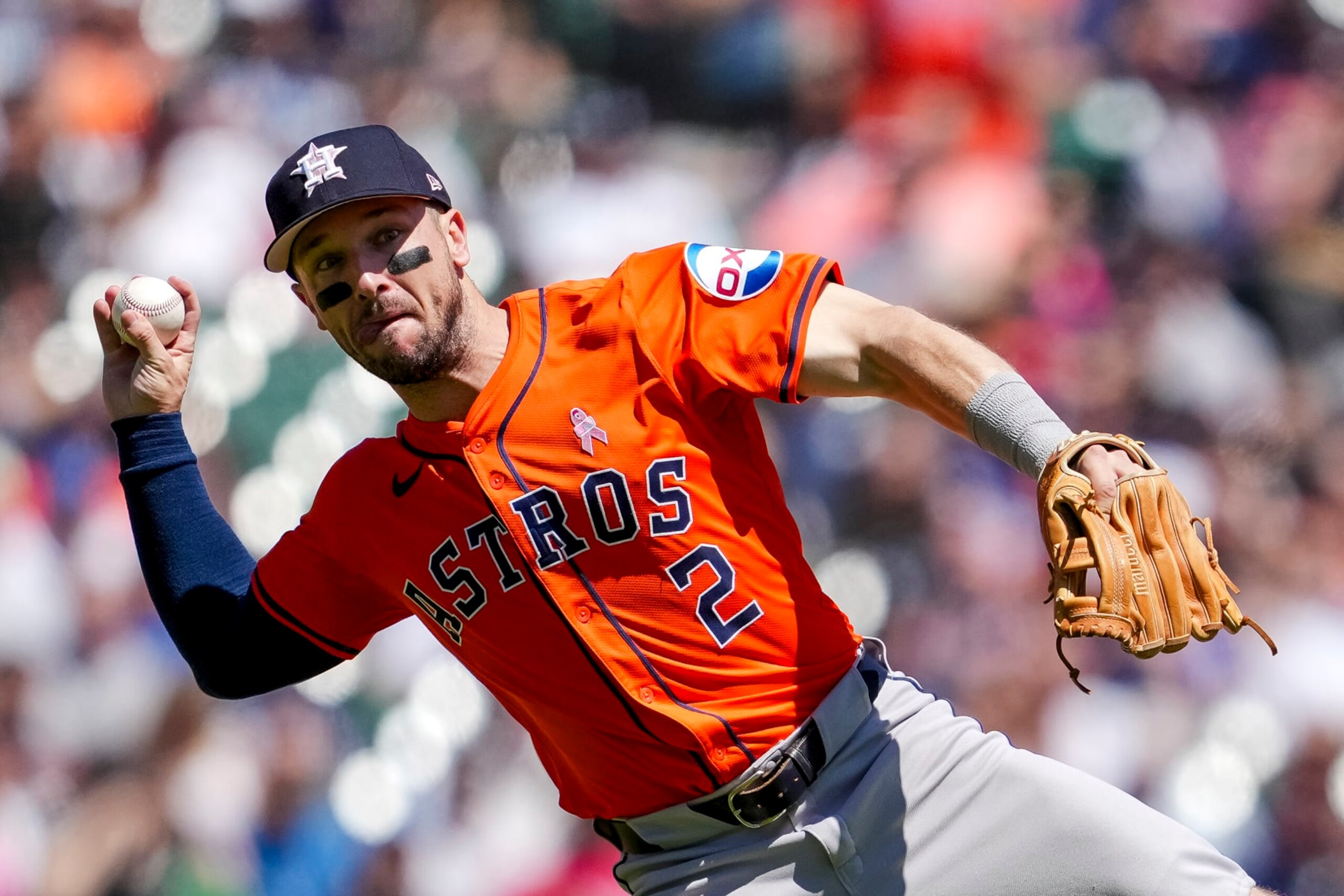 DETROIT, MICHIGAN - MAY 12: Alex Bregman #2 of the Houston Astros throws the ball against the Detroit Tigers at Comerica Park on May 12, 2024 in Detroit, Michigan. (Photo by Nic Antaya/Getty Images)