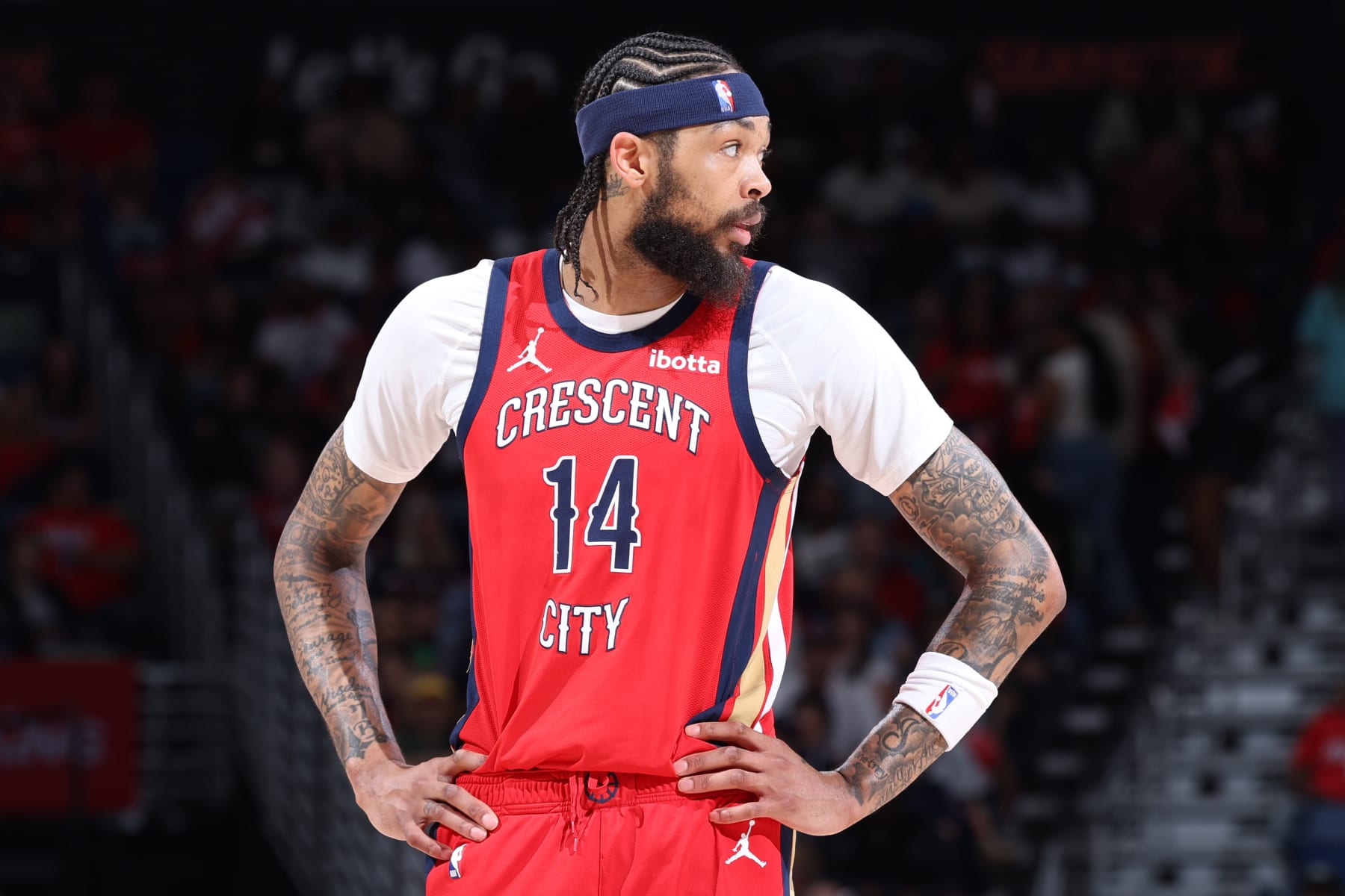 NEW ORLEANS, LA - APRIL 19:  Brandon Ingram #14 of the New Orleans Pelicans looks on during the game against the Sacramento Kings during the 2024 Play-In Tournament on April 19, 2024 at the Smoothie King Center in New Orleans, Louisiana. NOTE TO USER: User expressly acknowledges and agrees that, by downloading and or using this Photograph, user is consenting to the terms and conditions of the Getty Images License Agreement. Mandatory Copyright Notice: Copyright 2024 NBAE (Photo by Jeff Haynes./NBAE via Getty Images)