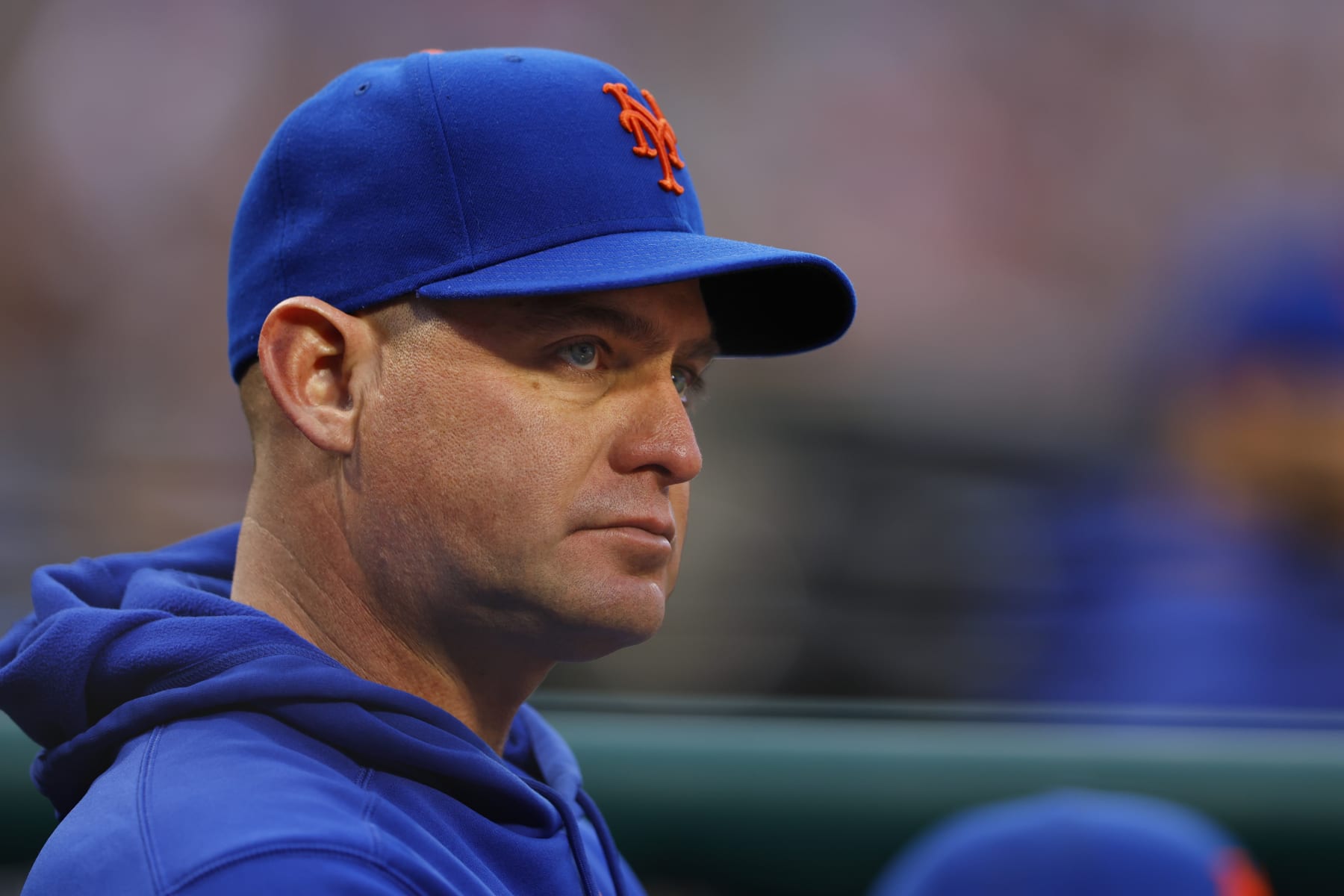 PHILADELPHIA, PENNSYLVANIA - MAY 16: Manager Carlos Mendoza #64 of the New York Mets looks on during a game against the Philadelphia Phillies at Citizens Bank Park on May 16, 2024 in Philadelphia, Pennsylvania. (Photo by Rich Schultz/Getty Images)