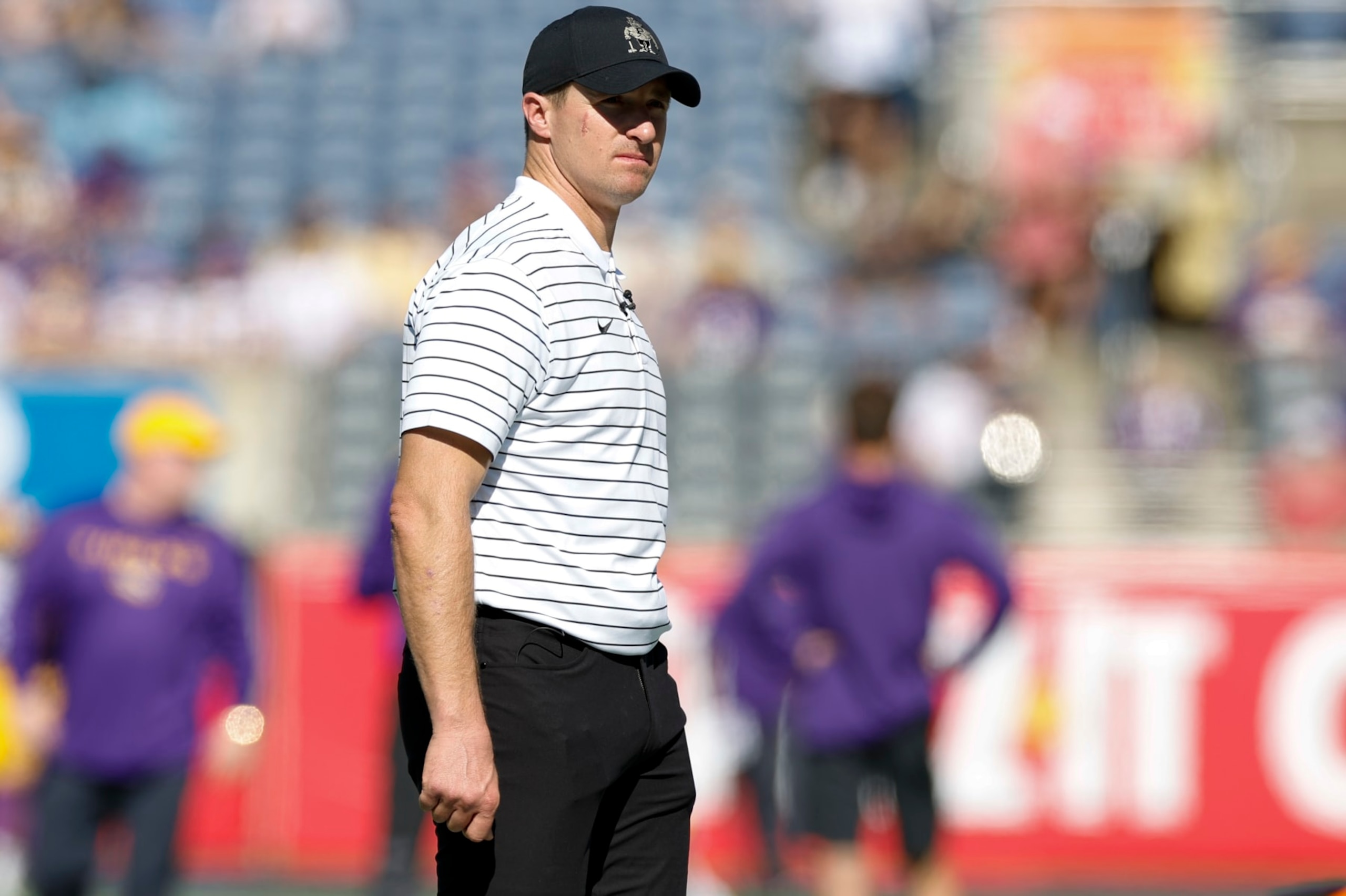 ORLANDO, FL - JANUARY 02: Purdue Boilermakers Assistant Coach Drew Brees looks on before the Cheez-It Citrus Bowl between the LSU Tigers and the Purdue Boilermakers on January 2, 2023 at Camping World Stadium in Orlando, Fl. (Photo by David Rosenblum/Icon Sportswire via Getty Images) ORLANDO, FL - JANUARY 02: Purdue Boilermakers Assistant Coach Drew Brees looks on before the Cheez-It Citrus Bowl between the LSU Tigers and the Purdue Boilermakers on January 2, 2023 at Camping World Stadium in Orlando, Fl. (Photo by David Rosenblum/Icon Sportswire via Getty Images)