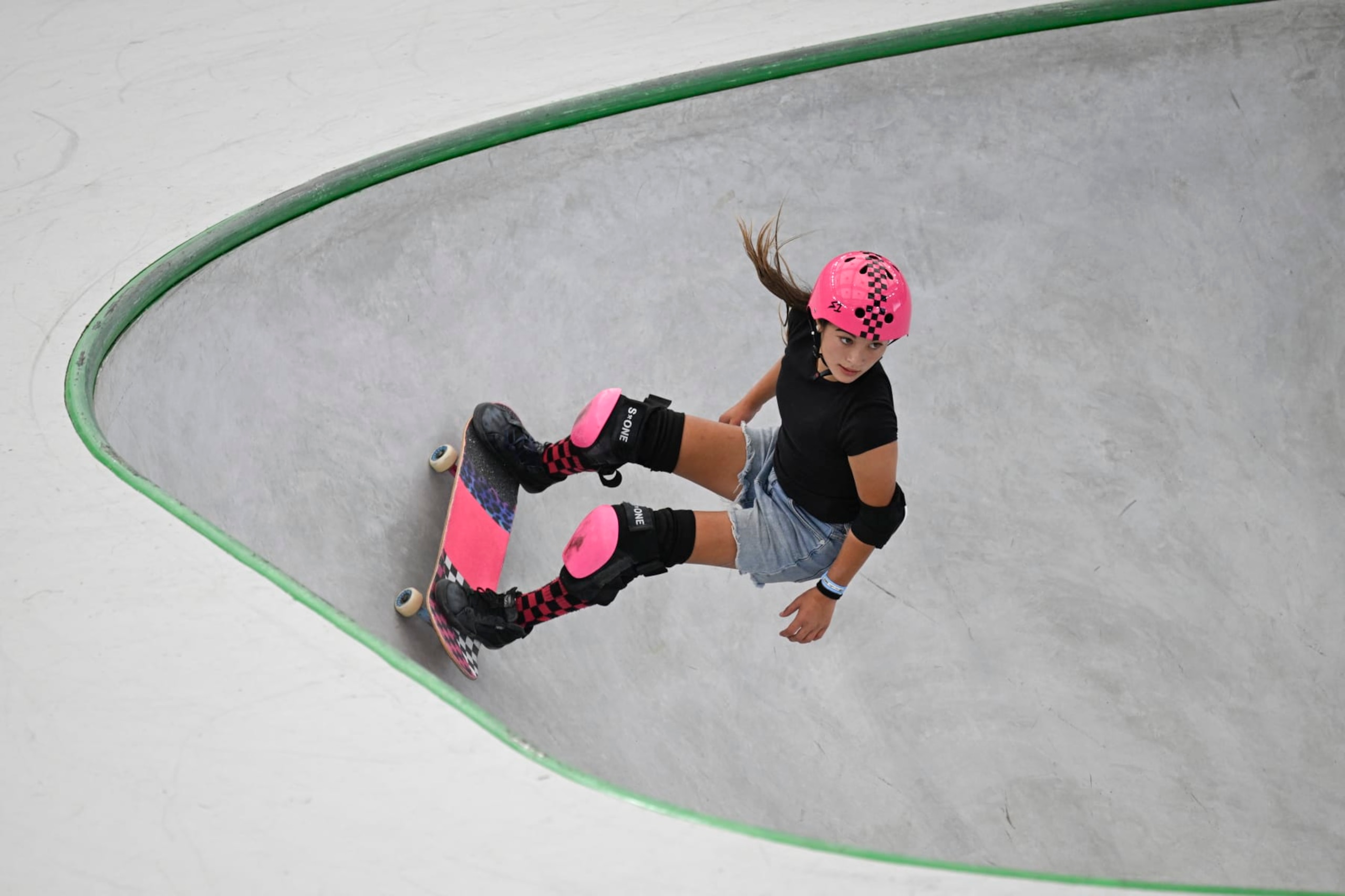 Australia's Arisa Trew competes in the women's skateboarding park final during the Olympic Qualifier Series for breaking, BMX freestyle, skateboarding, and sport climbing events ahead of the Paris 2024 Olympic and Paralympic Games, in Shanghai on May 19, 2024. (Photo by WANG Zhao / AFP) (Photo by WANG ZHAO/AFP via Getty Images)