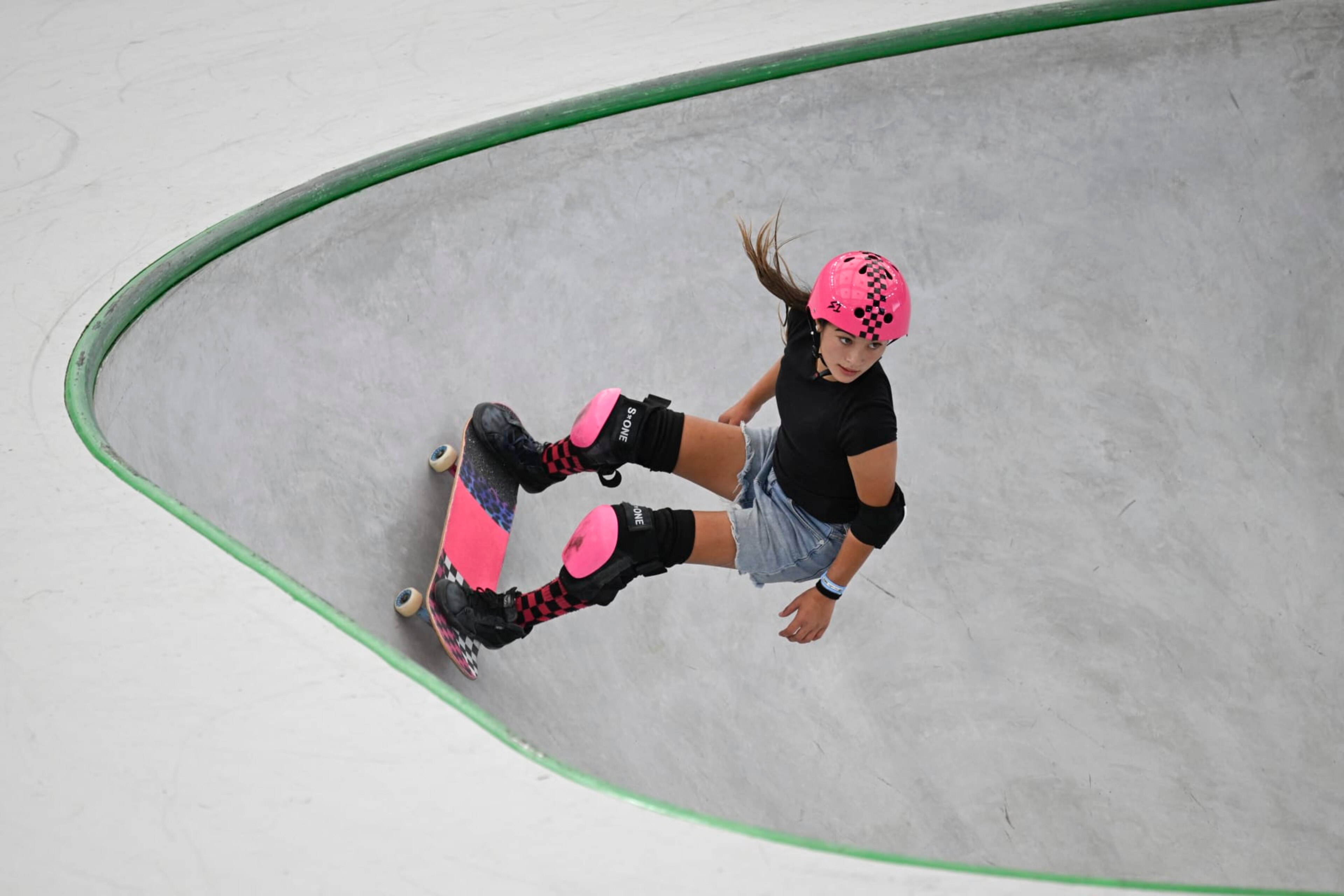 Australia's Arisa Trew competes in the women's skateboarding park final during the Olympic Qualifier Series for breaking, BMX freestyle, skateboarding, and sport climbing events ahead of the Paris 2024 Olympic and Paralympic Games, in Shanghai on May 19, 2024. (Photo by WANG Zhao / AFP) (Photo by WANG ZHAO/AFP via Getty Images) Australia's Arisa Trew competes in the women's skateboarding park final during the Olympic Qualifier Series for breaking, BMX freestyle, skateboarding, and sport climbing events ahead of the Paris 2024 Olympic and Paralympic Games, in Shanghai on May 19, 2024. (Photo by WANG Zhao / AFP) (Photo by WANG ZHAO/AFP via Getty Images)