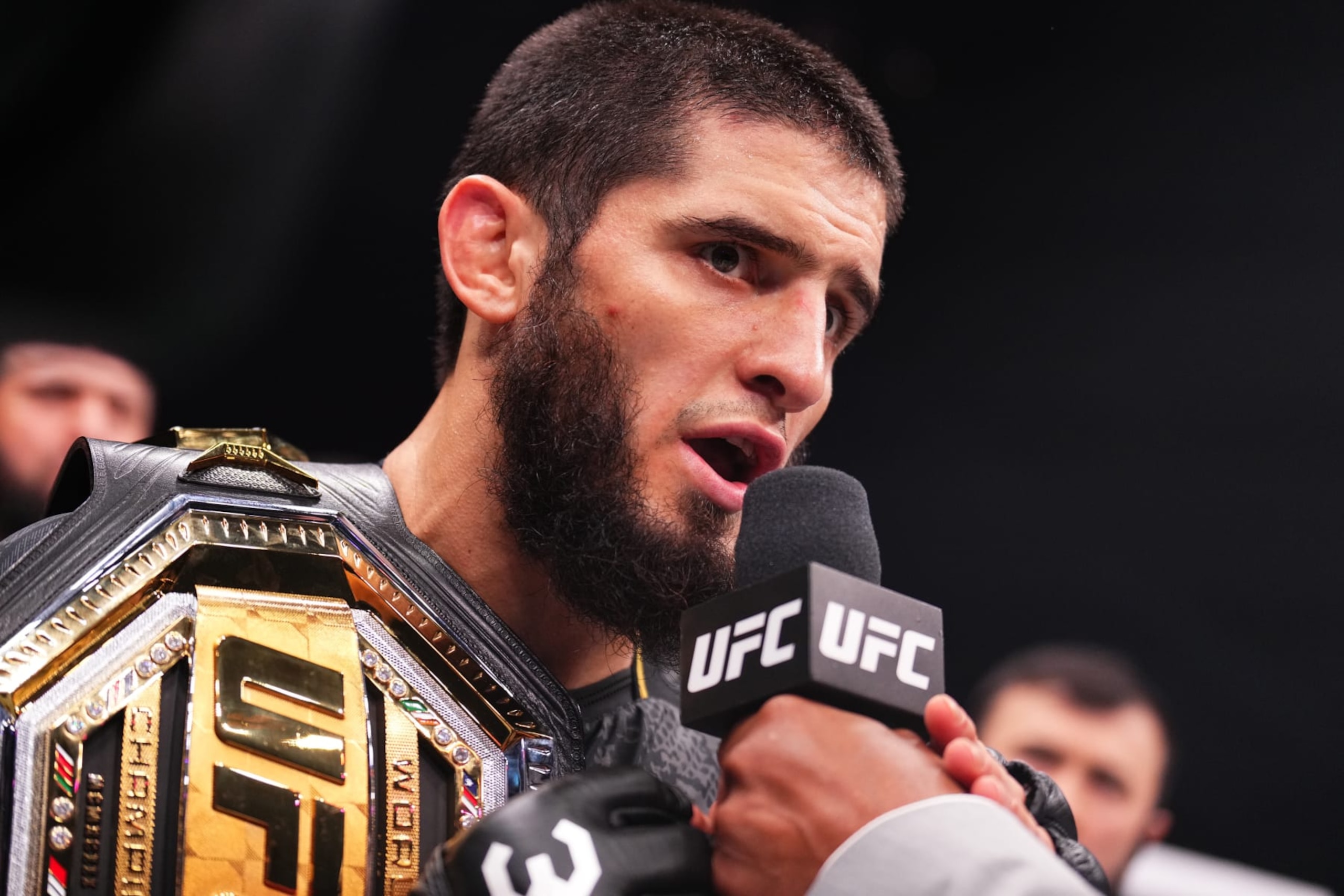 Islam Makhachev reacts after his knockout victory against Alexander Volkanovski