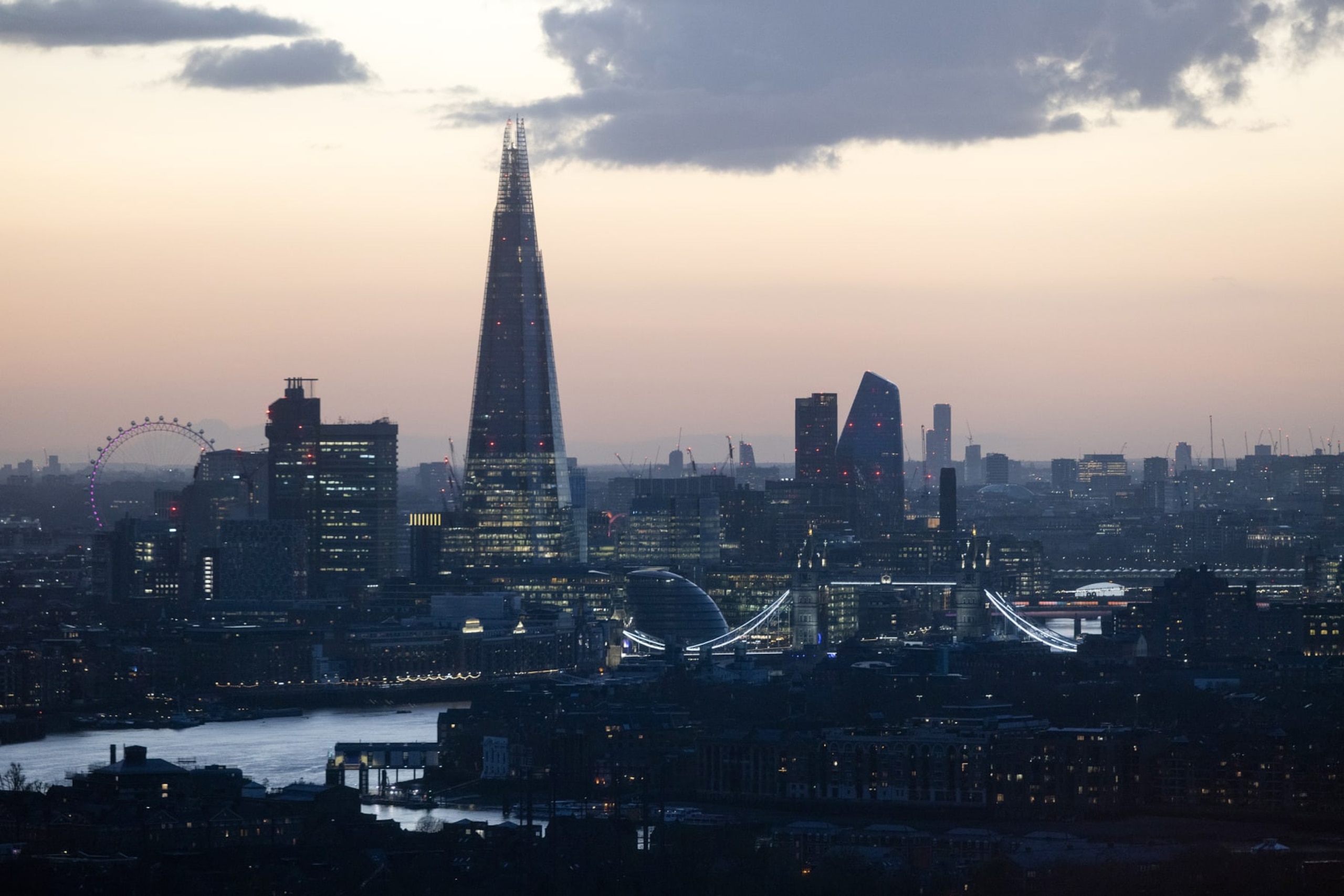 The Shard skyscraper next to Tower Bridge and other commercial office buildings in London, UK, on Friday, March 22, 2024. Real estate prices are bottoming and there's a great opportunity to move fast and buy assets at beaten-down prices, according to Blackstone Inc. President Jon Gray. Photographer: Chris Ratcliffe/Bloomberg via Getty Images