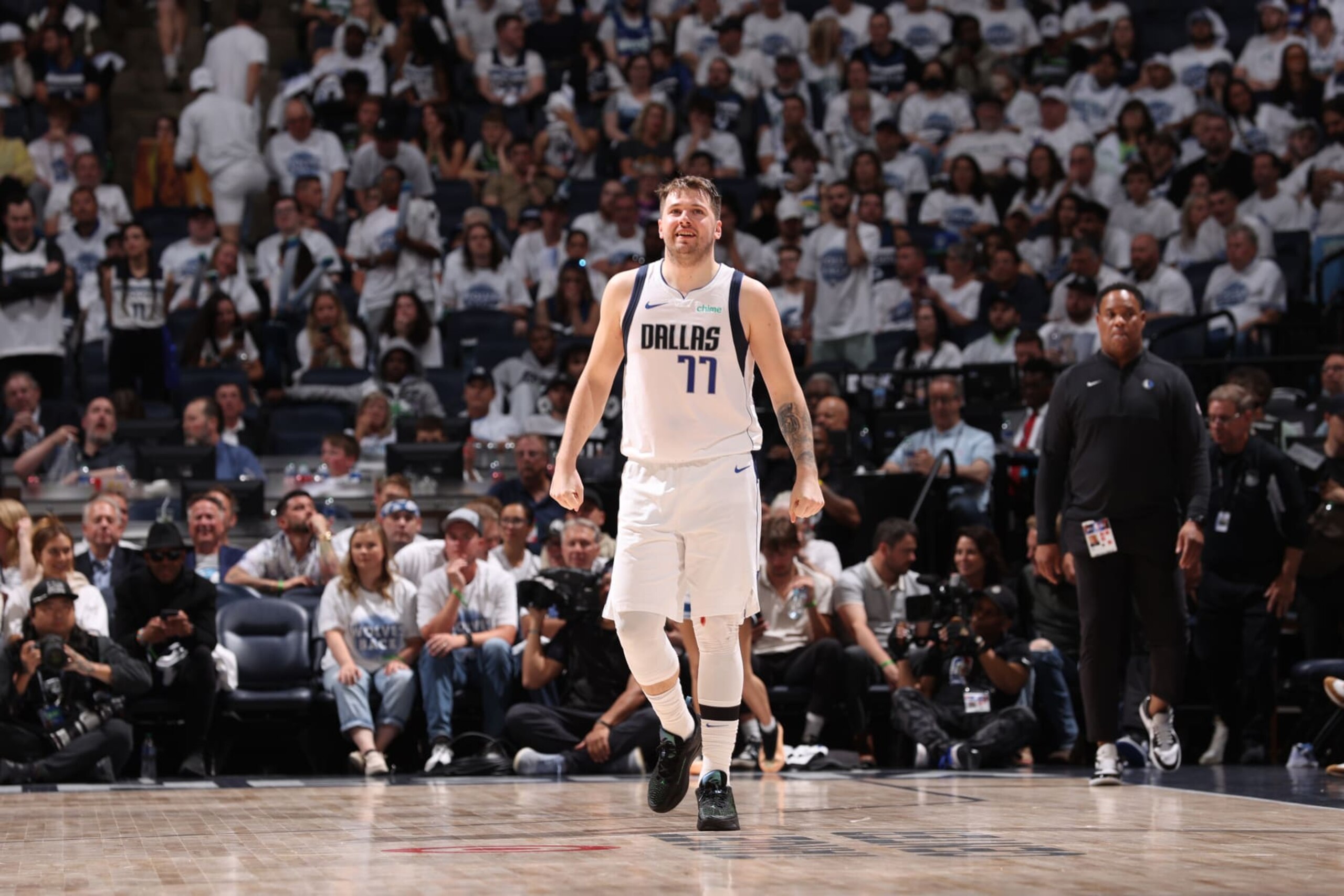 MINNEAPOLIS, MN - MAY 30: Luka Doncic #77 of the Dallas Mavericks smiles during the game against the Minnesota Timberwolves during Round 3 Game 5 of the 2024 NBA Playoffs on May 30, 2024 at Target Center in Minneapolis, Minnesota. NOTE TO USER: User expressly acknowledges and agrees that, by downloading and or using this Photograph, user is consenting to the terms and conditions of the Getty Images License Agreement. Mandatory Copyright Notice: Copyright 2024 NBAE (Photo by Joe Murphy/NBAE via Getty Images) MINNEAPOLIS, MN - MAY 30: Luka Doncic #77 of the Dallas Mavericks smiles during the game against the Minnesota Timberwolves during Round 3 Game 5 of the 2024 NBA Playoffs on May 30, 2024 at Target Center in Minneapolis, Minnesota. NOTE TO USER: User expressly acknowledges and agrees that, by downloading and or using this Photograph, user is consenting to the terms and conditions of the Getty Images License Agreement. Mandatory Copyright Notice: Copyright 2024 NBAE (Photo by Joe Murphy/NBAE via Getty Images)