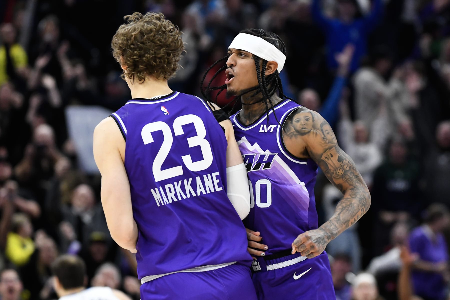 SALT LAKE CITY, UTAH - JANUARY 03: Jordan Clarkson #00 of the Utah Jazz celebrates a shot with teammate Lauri Markkanen #23 during the second half of a game against the Detroit Pistons at Delta Center on January 03, 2024 in Salt Lake City, Utah. NOTE TO USER: User expressly acknowledges and agrees that, by downloading and or using this photograph, User is consenting to the terms and conditions of the Getty Images License Agreement. (Photo by Alex Goodlett/Getty Images)