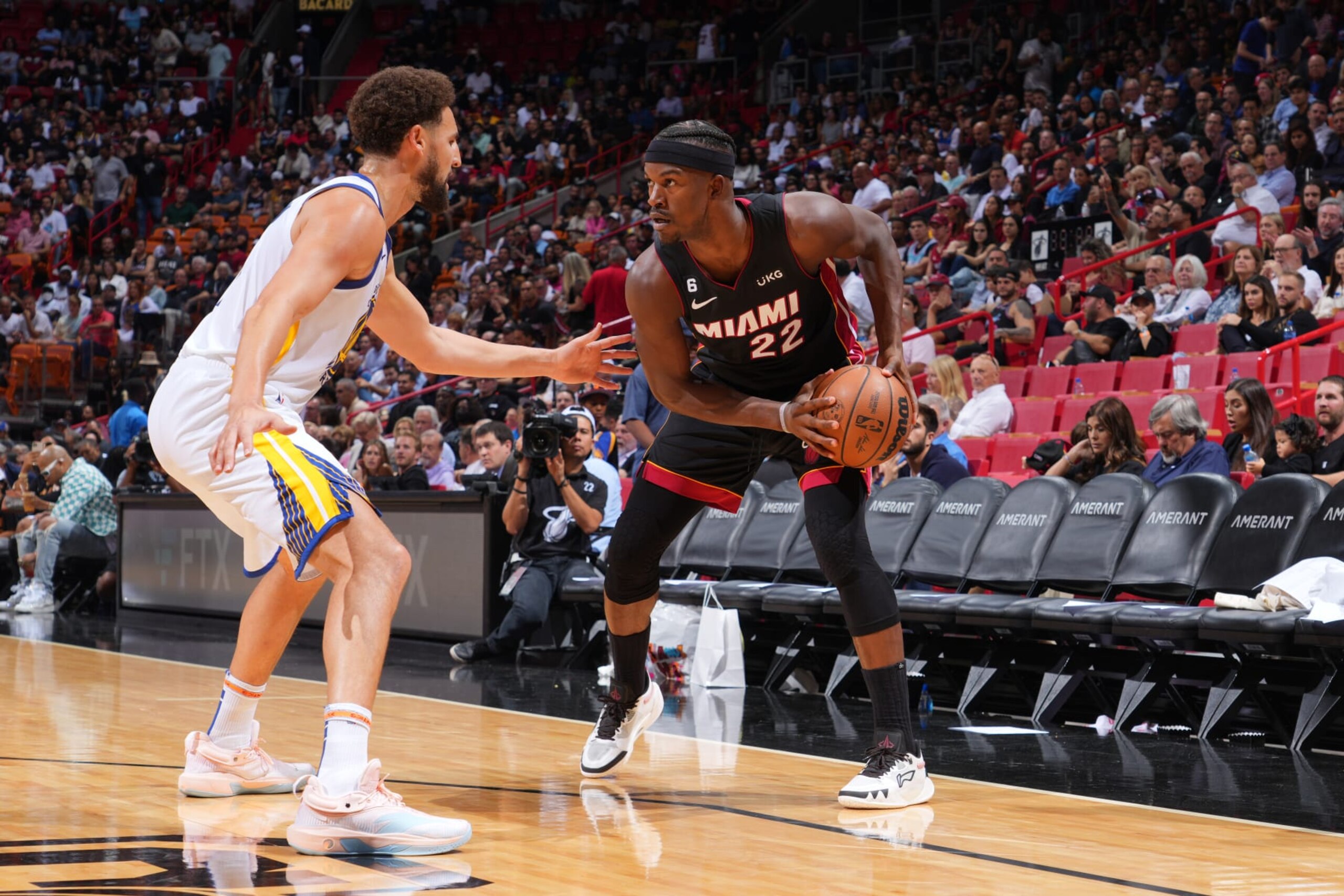 MIAMI, FL - NOVEMBER 1: Jimmy Butler #22 of the Miami Heat looks to pass the ball during the game against the Golden State Warriors on November 1, 2022 at FTX Arena in Miami, Florida. NOTE TO USER: User expressly acknowledges and agrees that, by downloading and or using this Photograph, user is consenting to the terms and conditions of the Getty Images License Agreement. Mandatory Copyright Notice: Copyright 2022 NBAE (Photo by Jesse D. Garrabrant/NBAE via Getty Images) MIAMI, FL - NOVEMBER 1: Jimmy Butler #22 of the Miami Heat looks to pass the ball during the game against the Golden State Warriors on November 1, 2022 at FTX Arena in Miami, Florida. NOTE TO USER: User expressly acknowledges and agrees that, by downloading and or using this Photograph, user is consenting to the terms and conditions of the Getty Images License Agreement. Mandatory Copyright Notice: Copyright 2022 NBAE (Photo by Jesse D. Garrabrant/NBAE via Getty Images)