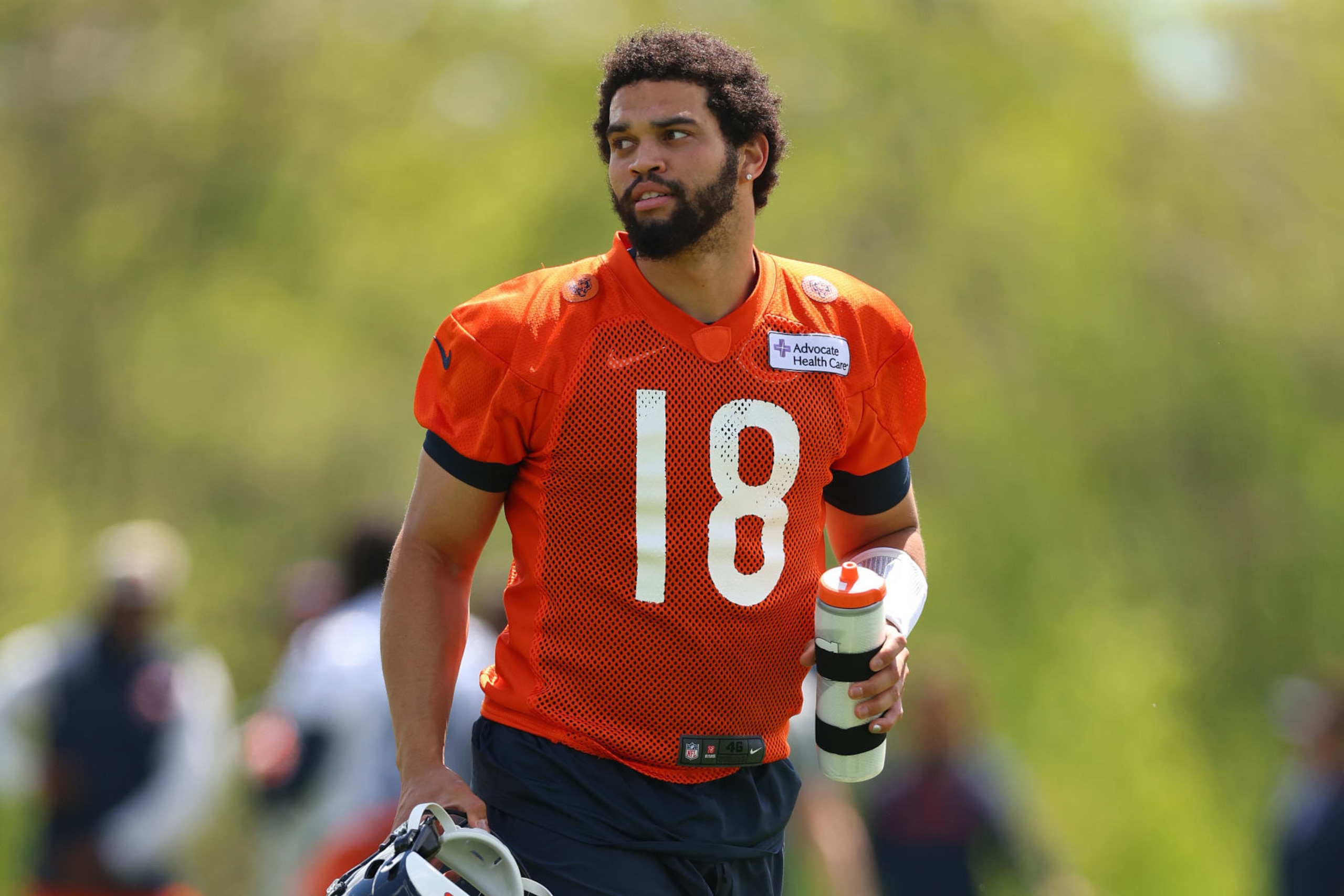 LAKE FOREST, ILLINOIS - MAY 11: Caleb Williams #18 of the Chicago Bears looks on during Chicago Bears Rookie Minicamp at Halas Hall on May 11, 2024 in Lake Forest, Illinois.  (Photo by Michael Reaves/Getty Images)