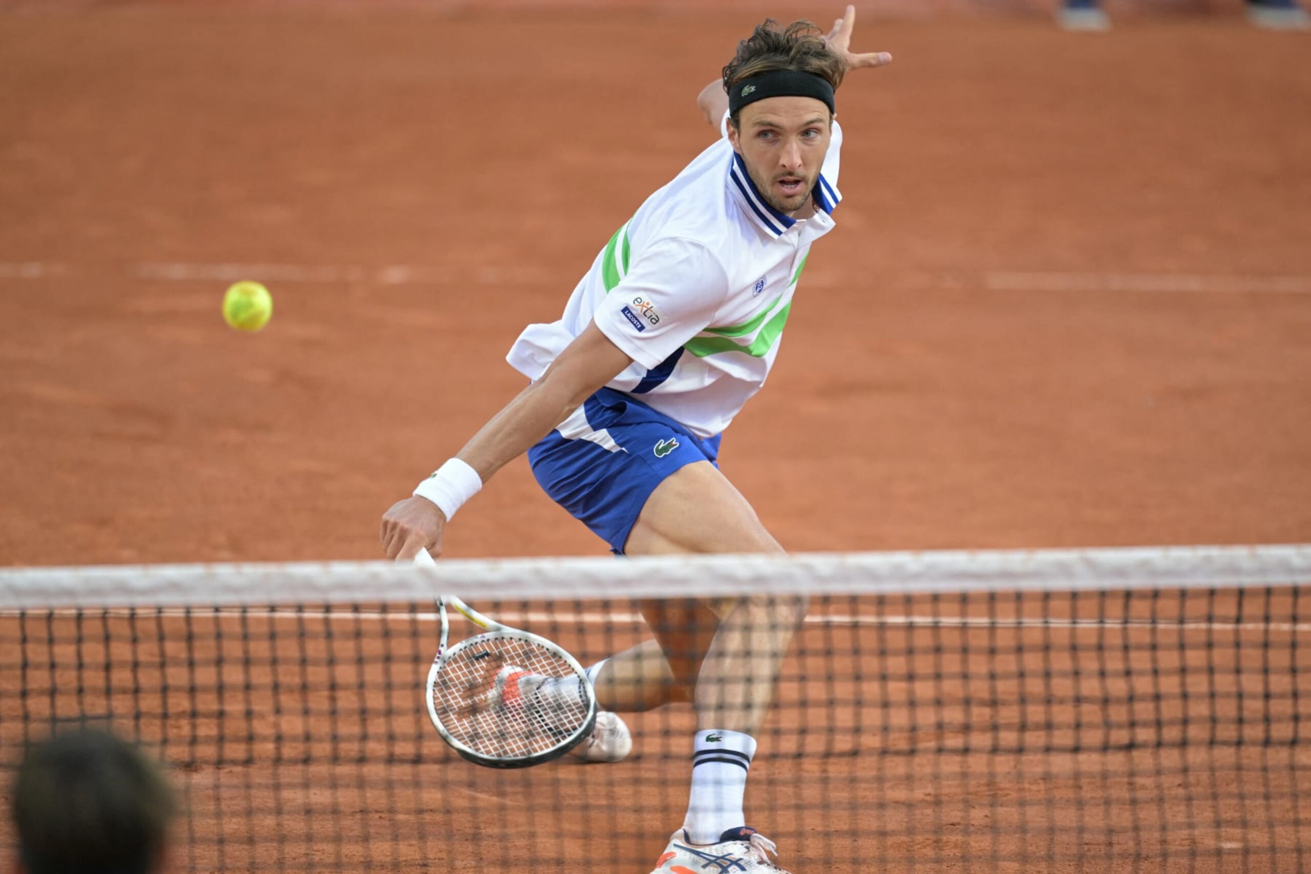 France's Arthur Rinderknech plays a backhand return to Argentina's Tomas Martin Etcheverry during their men's singles match on day five of the French Open tennis tournament at the Roland Garros Complex in Paris on May 30, 2024. (Photo by Bertrand GUAY / AFP) (Photo by BERTRAND GUAY/AFP via Getty Images) France's Arthur Rinderknech plays a backhand return to Argentina's Tomas Martin Etcheverry during their men's singles match on day five of the French Open tennis tournament at the Roland Garros Complex in Paris on May 30, 2024. (Photo by Bertrand GUAY / AFP) (Photo by BERTRAND GUAY/AFP via Getty Images)