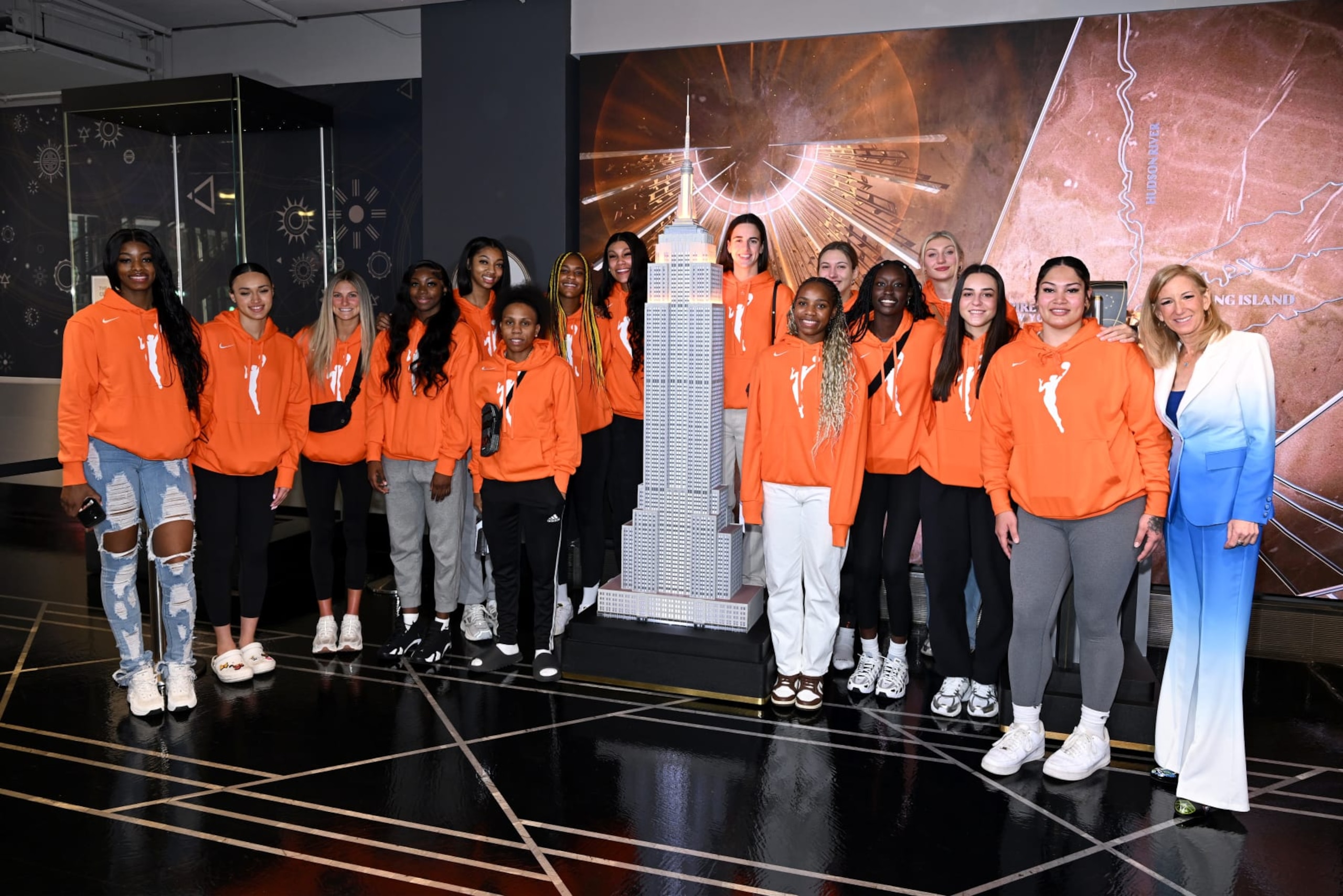 NEW YORK, NEW YORK - APRIL 15: Cathy Engelbert and the 2024 featured Draft Class at The Empire State Building on April 15, 2024 in New York City. (Photo by Roy Rochlin/Getty Images for Empire State Realty Trust) NEW YORK, NEW YORK - APRIL 15: Cathy Engelbert and the 2024 featured Draft Class at The Empire State Building on April 15, 2024 in New York City. (Photo by Roy Rochlin/Getty Images for Empire State Realty Trust)
