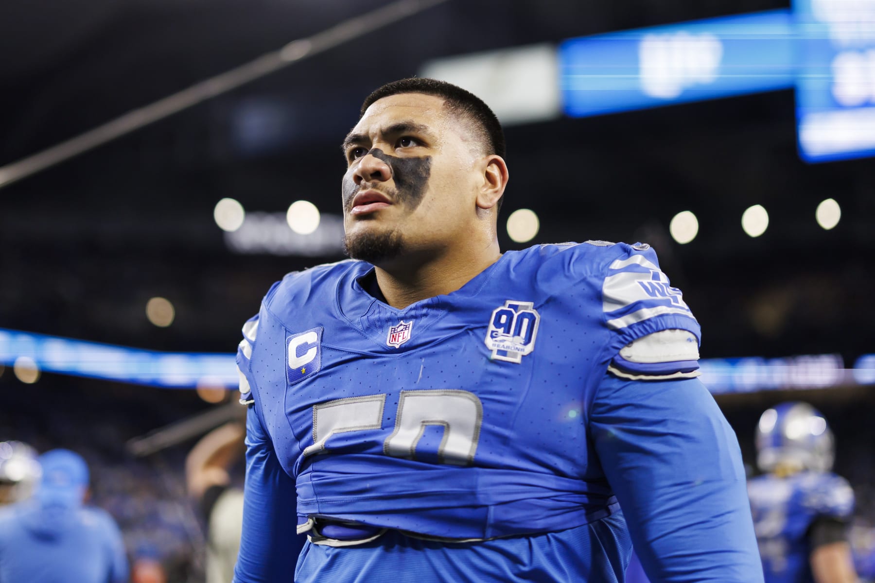 DETROIT, MICHIGAN - JANUARY 14: Penei Sewell #58 of the Detroit Lions looks on during pregame warmups prior to an NFC Wild Card Playoff football game against the Los Angeles Rams at Ford Field on January 14, 2024 in Detroit, Michigan. (Photo by Ryan Kang/Getty Images)