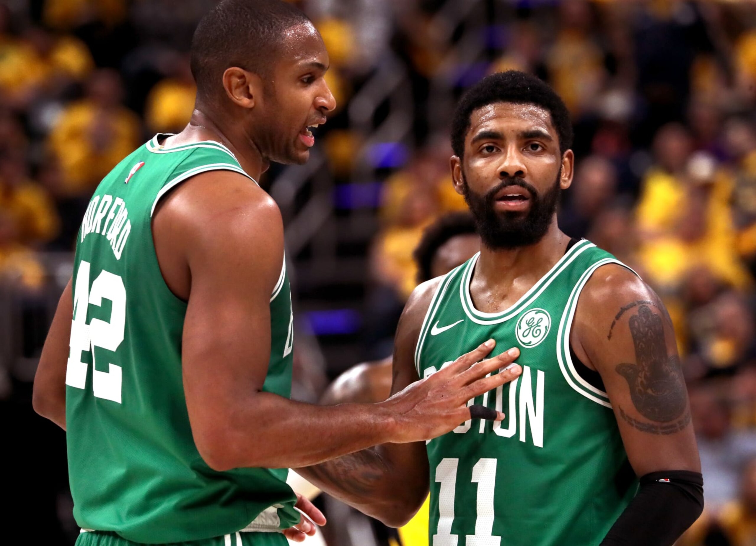 INDIANAPOLIS, IN - APRIL 19:  Boston Celtics center Al Horford (42) and Boston Celtics guard Kyrie Irving (11) talk during a break in the fourth quarter.  The Indiana Pacers host the Boston Celtics in Game 3 of Round 1 of the Eastern Conference Playoffs at Bankers Life Field House in Indianapolis on April 19, 2019. (Photo by Barry Chin/The Boston Globe via Getty Images)