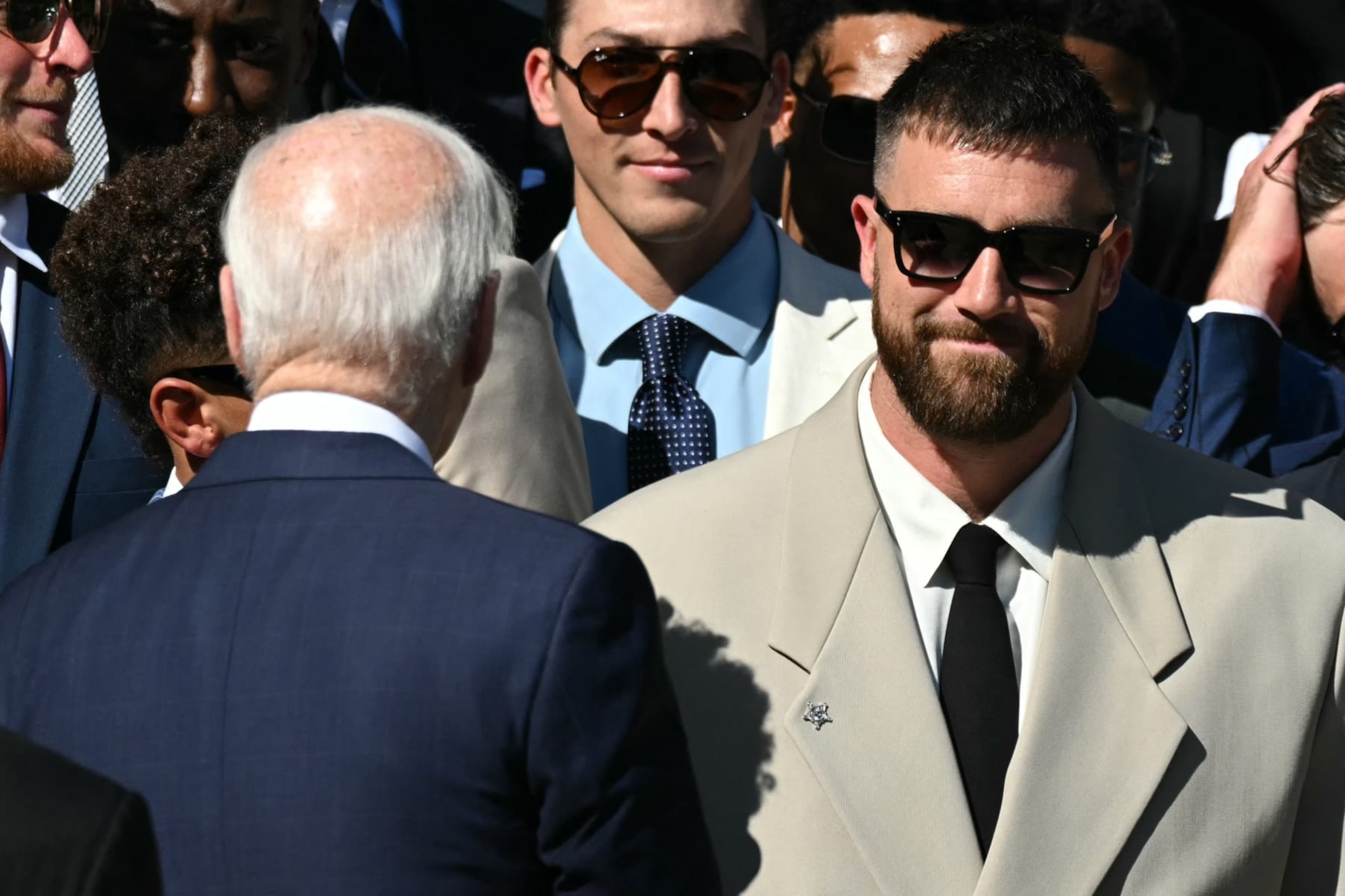 US President Joe Biden greets players including Kansas City Chiefs' tight end Travis Kelce (R) during a celebration for the Kansas City Chiefs, 2024 Super Bowl champions, on the South Lawn of the White House in Washington, DC, on May 31, 2024. (Photo by SAUL LOEB / AFP) (Photo by SAUL LOEB/AFP via Getty Images) US President Joe Biden greets players including Kansas City Chiefs' tight end Travis Kelce (R) during a celebration for the Kansas City Chiefs, 2024 Super Bowl champions, on the South Lawn of the White House in Washington, DC, on May 31, 2024. (Photo by SAUL LOEB / AFP) (Photo by SAUL LOEB/AFP via Getty Images)