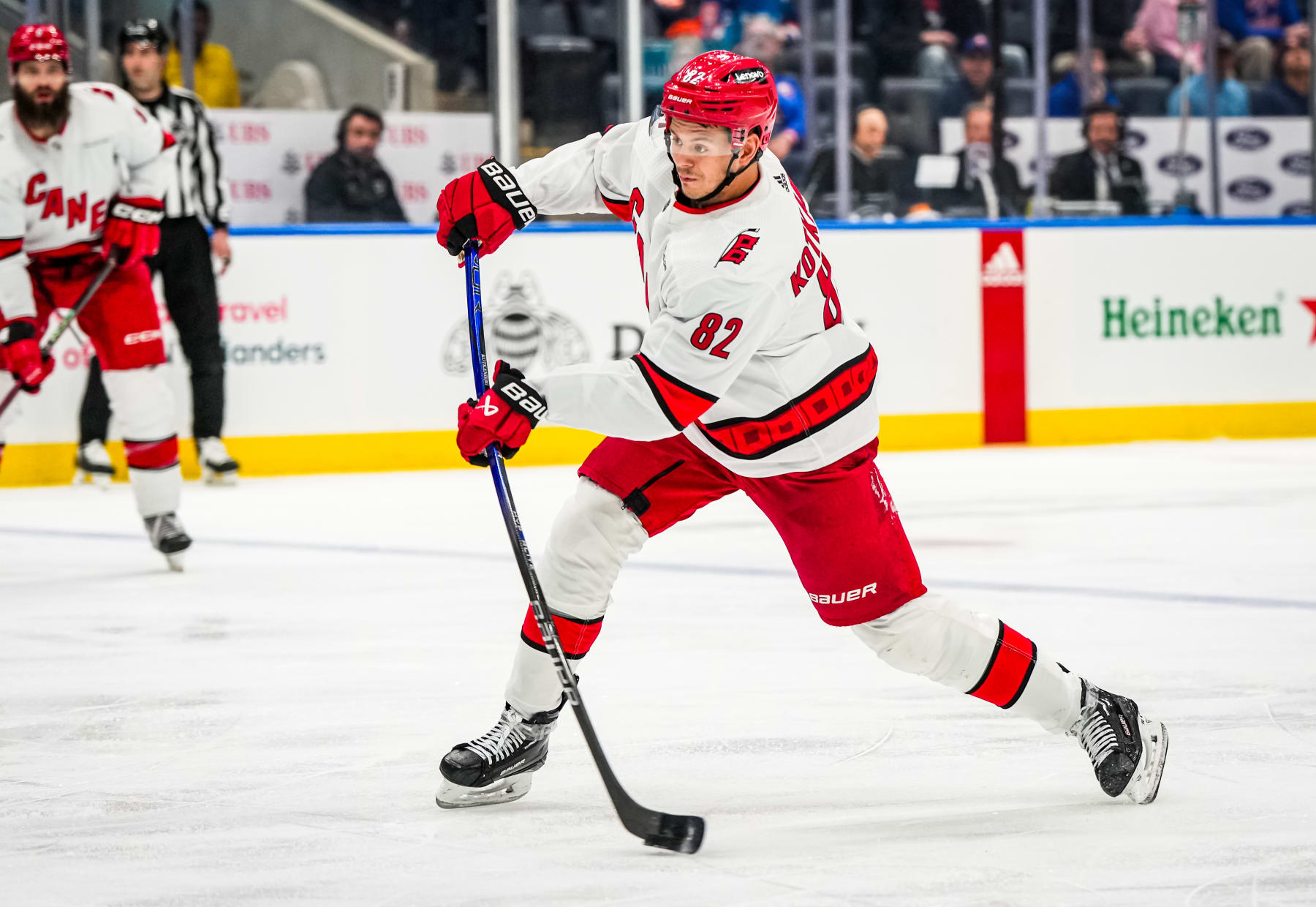 ELMONT, NEW YORK - APRIL 27:  Jesperi Kotkaniemi #82 of the Carolina Hurricanes shoots the puck during the second period against the New York Islanders in Game Four of the First Round of the 2024 Stanley Cup Playoffs at UBS Arena on April 27, 2024 in Elmont, New York. (Photo by Josh Lavallee/NHLI via Getty Images)