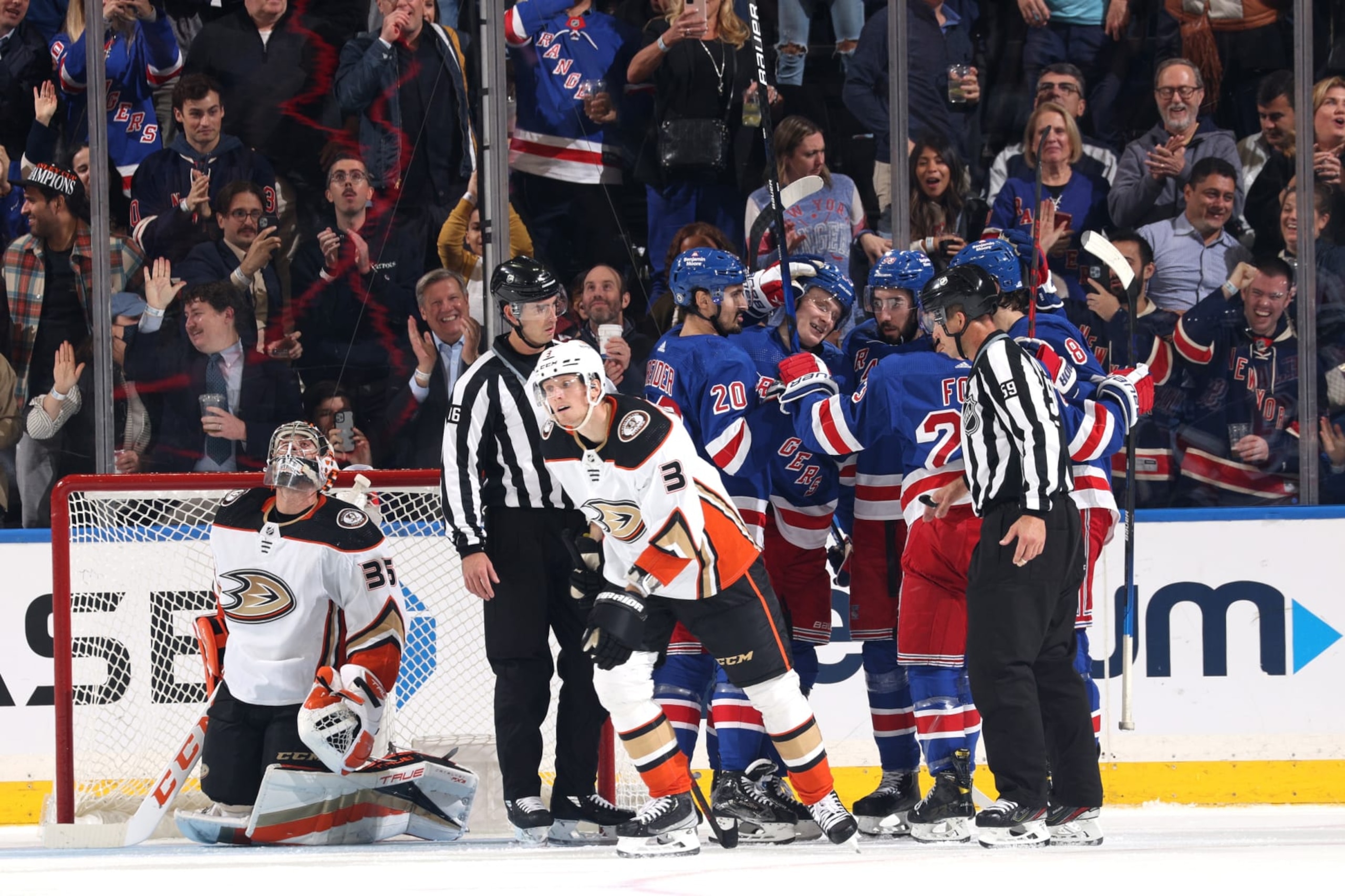 NEW YORK, NEW YORK - OCTOBER 17:  Kaapo Kakko #24 of the New York Rangers celebrates with teammates after scoring a goal in the second period against the Anaheim Ducks at Madison Square Garden on October 17, 2022 in New York City. (Photo by Jared Silber/NHLI via Getty Images)