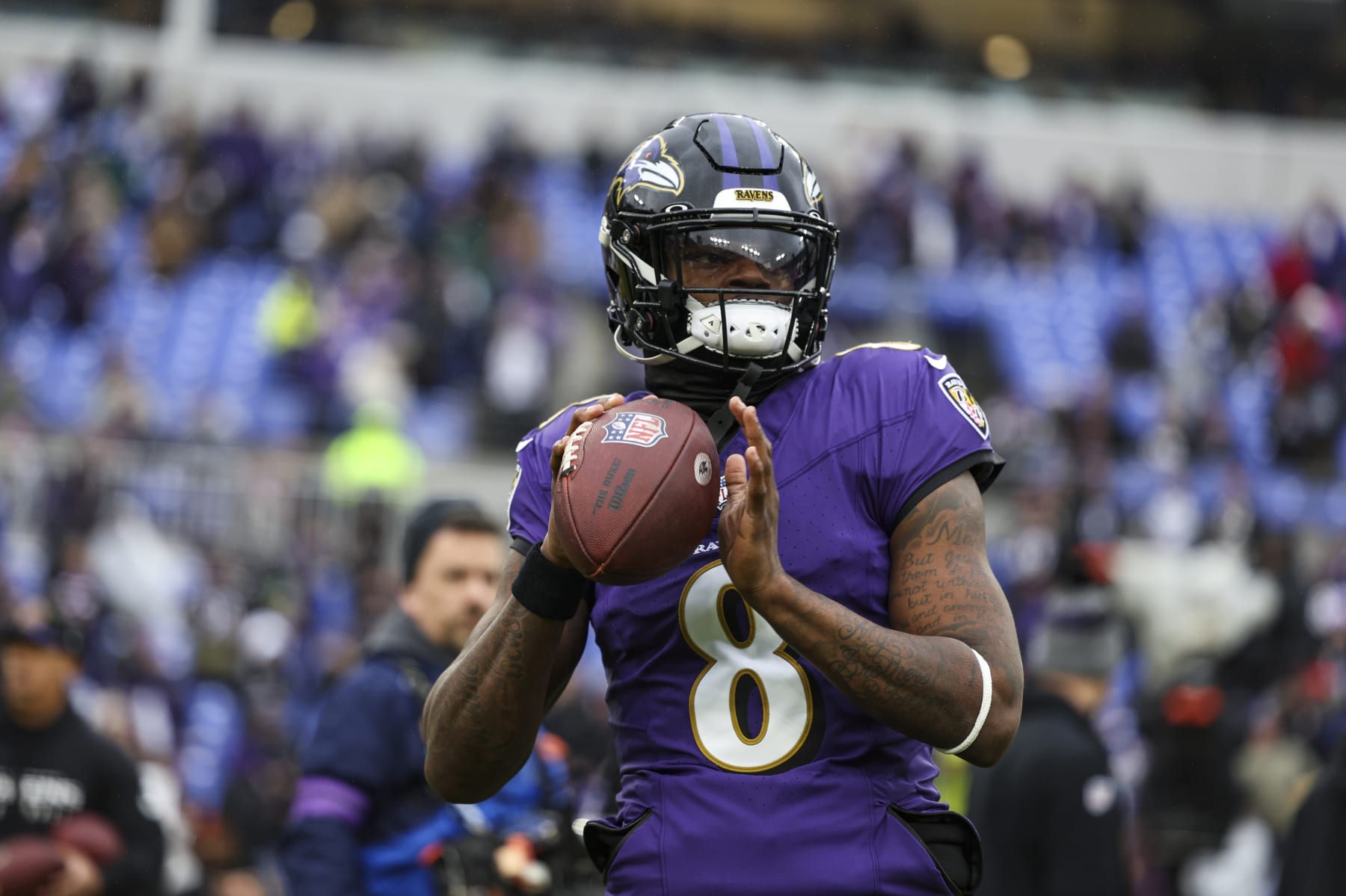 BALTIMORE, MD - JANUARY 28: Lamar Jackson #8 of the Baltimore Ravens warms up prior to the AFC Championship NFL football game against the Kansas City Chiefs at M&T Bank Stadium on January 28, 2024 in Baltimore, Maryland. (Photo by Perry Knotts/Getty Images) BALTIMORE, MD - JANUARY 28: Lamar Jackson #8 of the Baltimore Ravens warms up prior to the AFC Championship NFL football game against the Kansas City Chiefs at M&T Bank Stadium on January 28, 2024 in Baltimore, Maryland. (Photo by Perry Knotts/Getty Images)