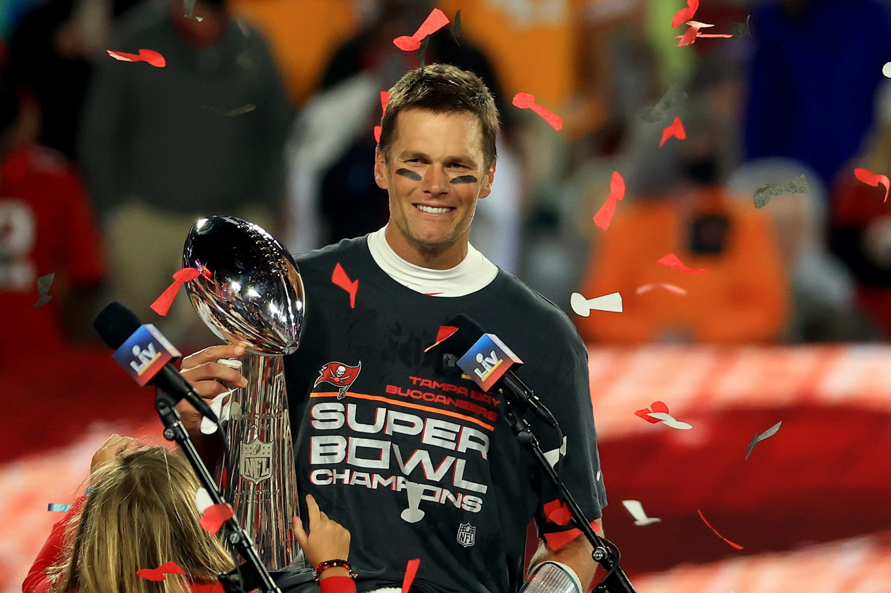 TAMPA, FLORIDA - FEBRUARY 07: Tom Brady #12 of the Tampa Bay Buccaneers hoists the Vince Lombardi Trophy after winning Super Bowl LV at Raymond James Stadium on February 07, 2021 in Tampa, Florida. The Buccaneers defeated the Chiefs 31-9. (Photo by Mike Ehrmann/Getty Images)