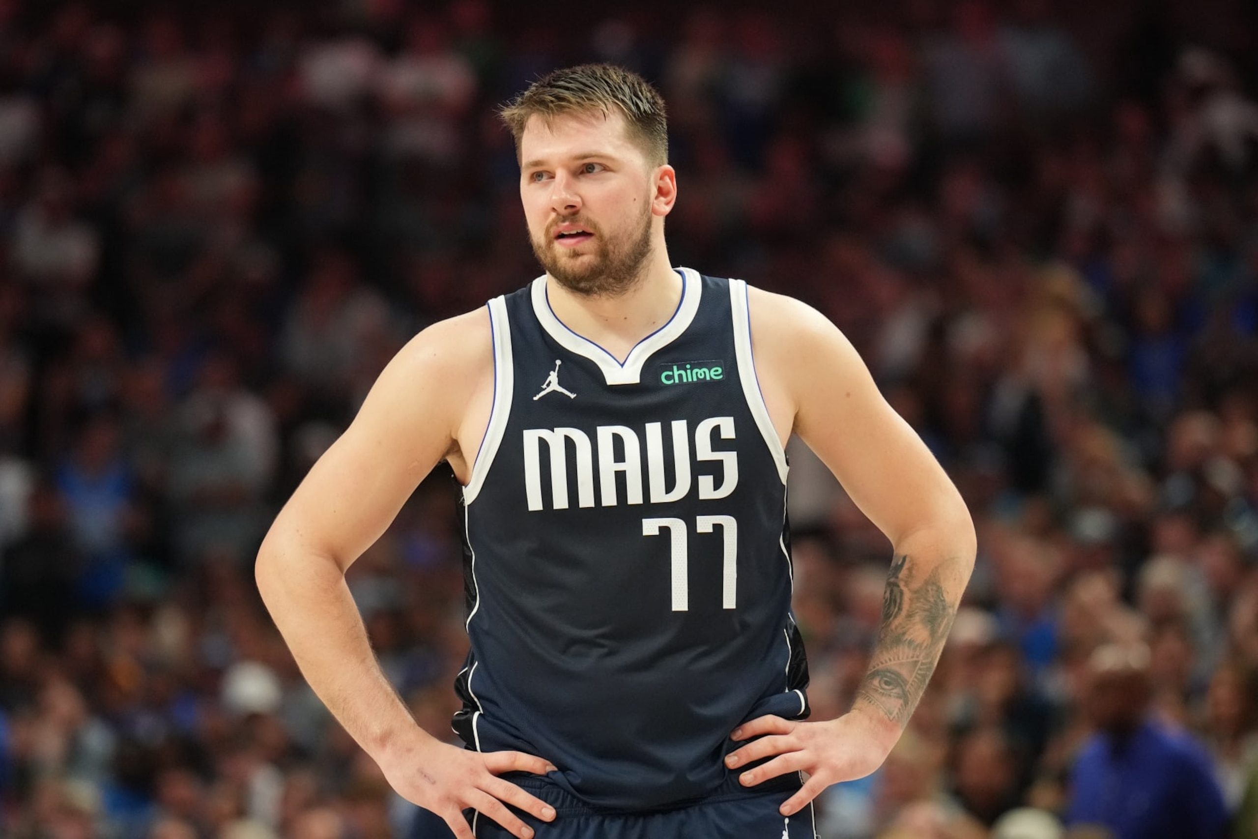 DALLAS, TX - MAY 28:  Luka Doncic #77 of the Dallas Mavericks looks on during the game against the Minnesota Timberwolves during Game 3 of the Western Conference Finals of the 2024 NBA Playoffs on May 28, 2024 at the American Airlines Center in Dallas, Texas. NOTE TO USER: User expressly acknowledges and agrees that, by downloading and or using this photograph, User is consenting to the terms and conditions of the Getty Images License Agreement. Mandatory Copyright Notice: Copyright 2024 NBAE (Photo by Jesse D. Garrabrant/NBAE via Getty Images)