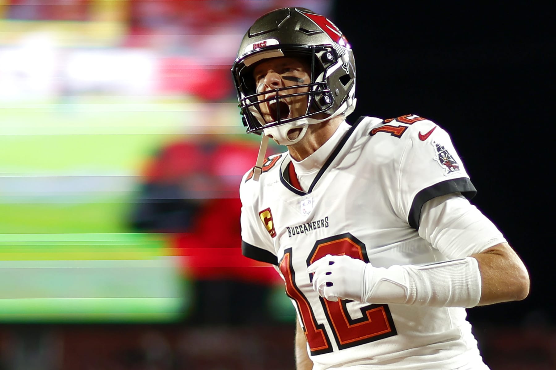TAMPA, FLORIDA - JANUARY 16: Tom Brady #12 of the Tampa Bay Buccaneers yells as he runs on the field prior to the NFC Wild Card playoff game against the Dallas Cowboys at Raymond James Stadium on January 16, 2023 in Tampa, Florida. (Photo by Mike Ehrmann/Getty Images)