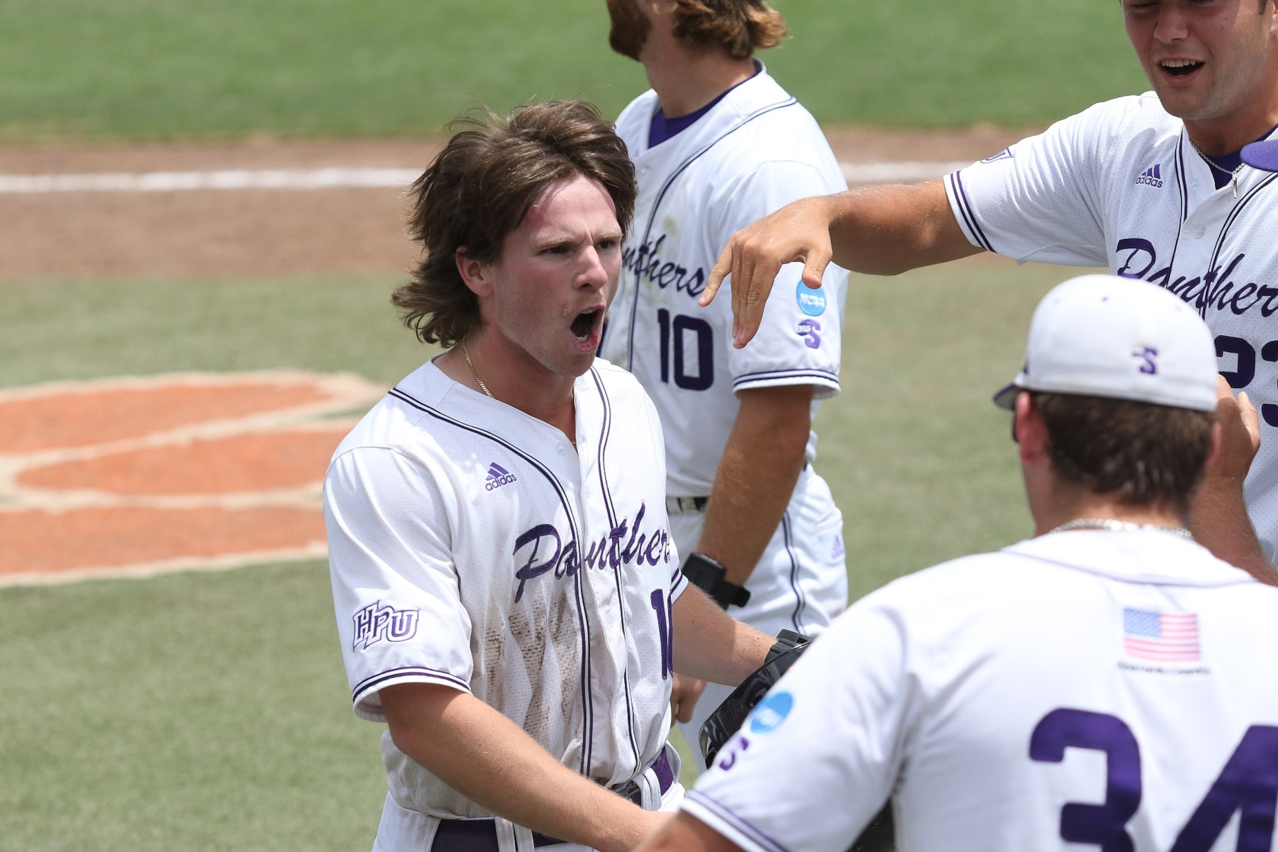 CLEMSON, SC - JUNE 01: High Point Panthers outfielder Konni Durschlag (16) celebrates scoring a run during the NCAA Division 1 Regional College Baseball game between the High Point Panthers and the Vanderbilt Commodores  on June 1, 2024, at Doug Kingsmore Stadium in Clemson, S.C.   (Photo by John Byrum/Icon Sportswire via Getty Images)