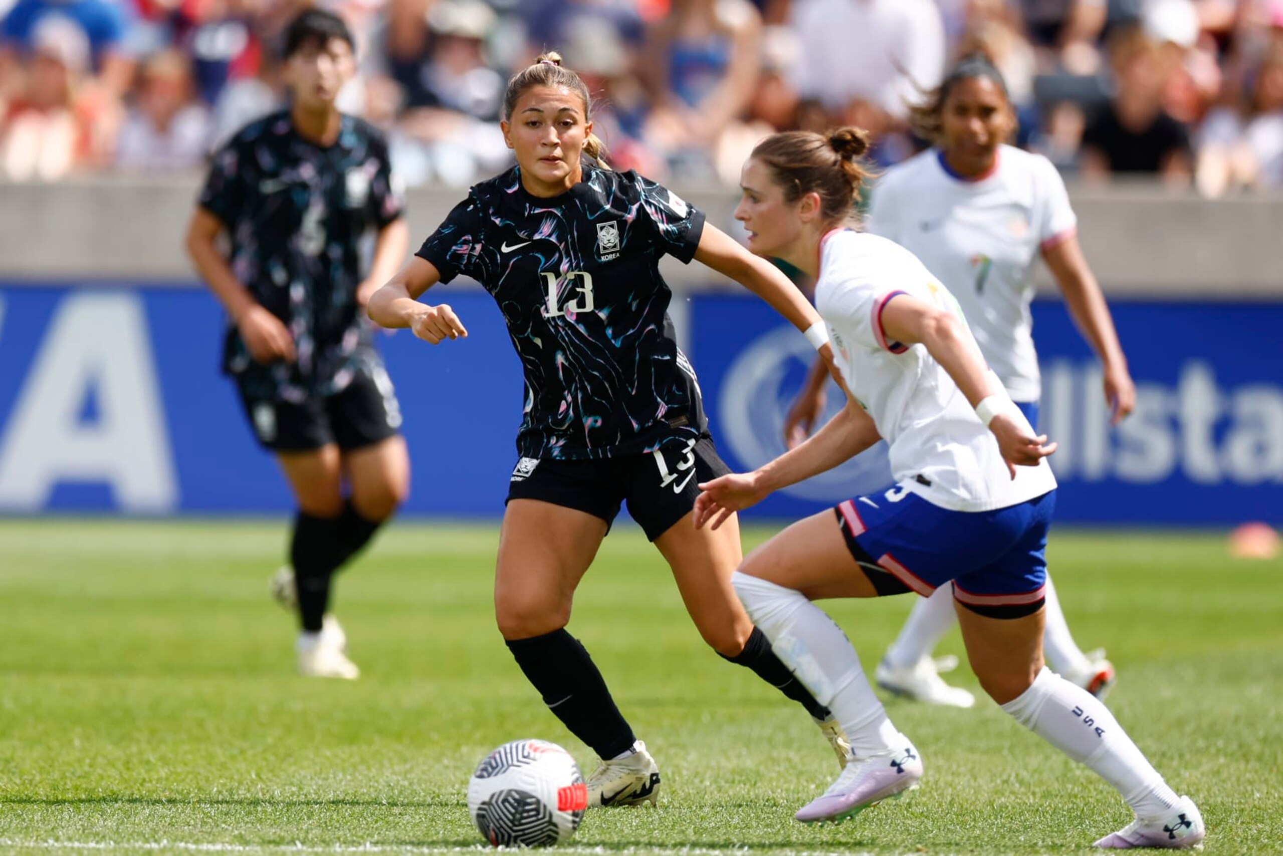 COMMERCE CITY, COLORADO - JUNE 01: Casey Phair #13 defends the U.S. Women's National Team at Dick's Sporting Goods Park on June 1, 2024 in Commerce City, Colorado. (Photo by C. Morgan Engel/Getty Images)