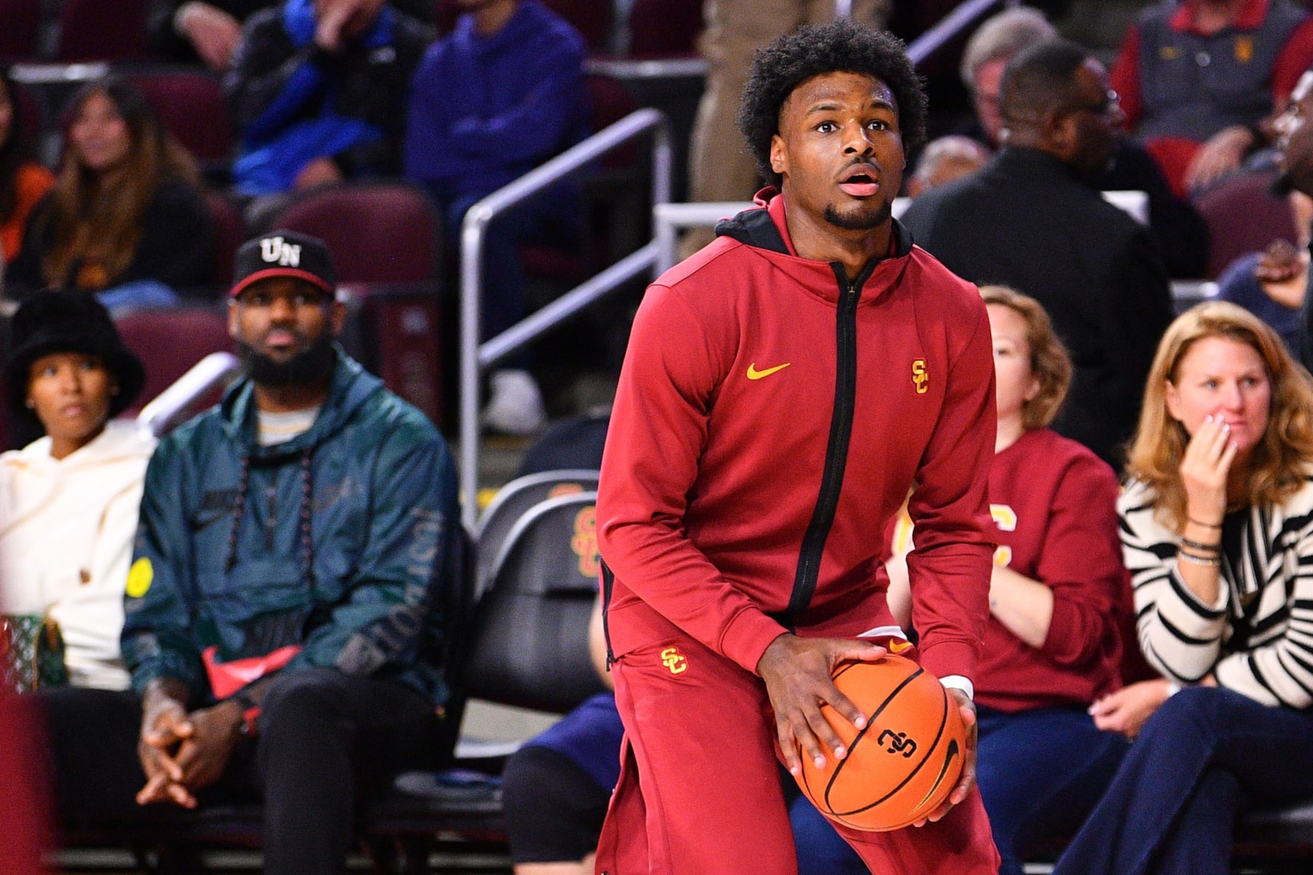 LOS ANGELES, CA - JANUARY 10: Lebron and Savannah James watch their son USC Trojans guard Bronny James (6) warm up before the college basketball game between the Washington State Cougars and the USC Trojans on January 10, 2024 at Galen Center in Los Angeles, CA. (Photo by Brian Rothmuller/Icon Sportswire via Getty Images)