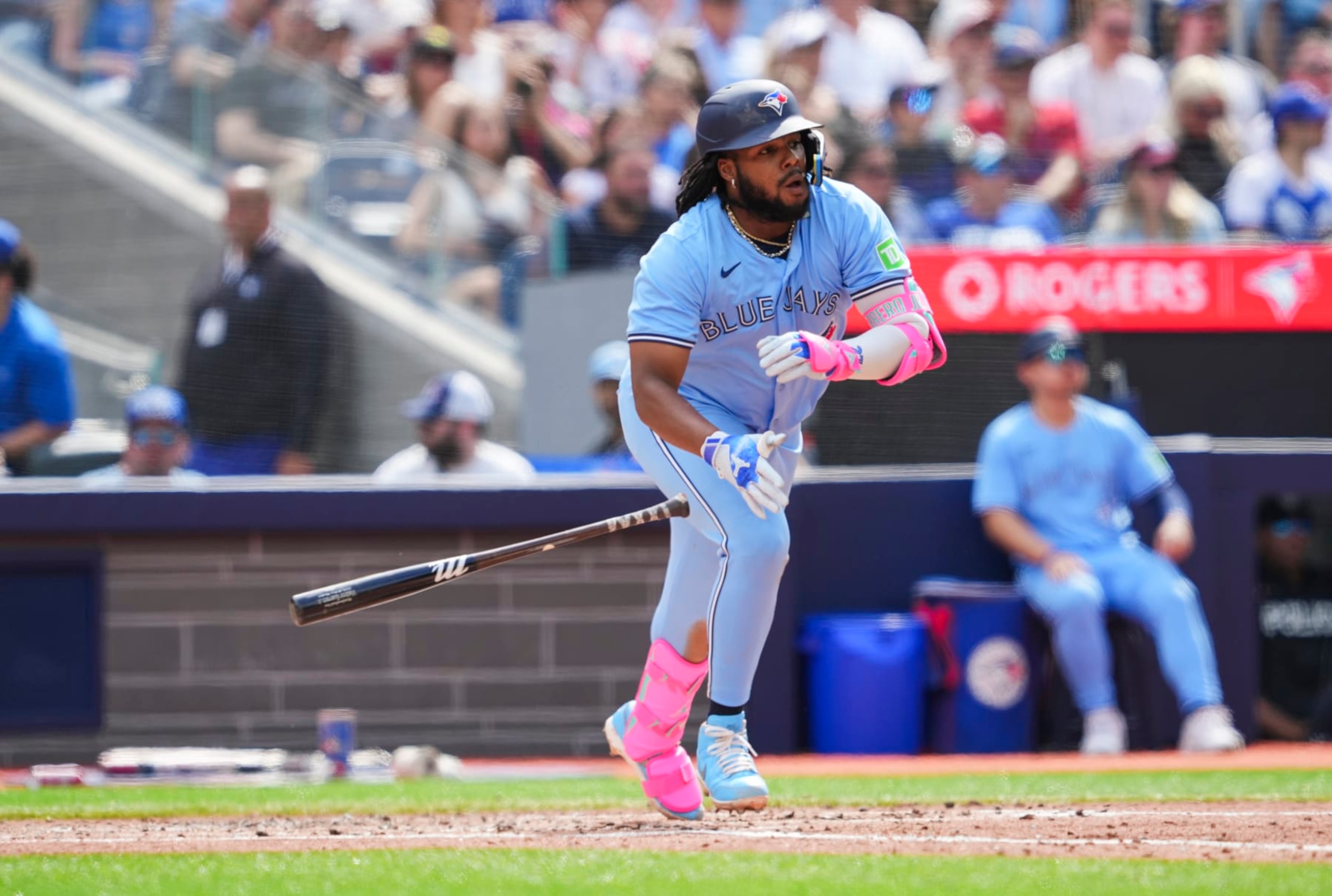 TORONTO, ON - JUNE 1: Vladimir Guerrero Jr. #27 of the Toronto Blue Jays hits a single against the Pittsburgh Pirates during the third inning in their MLB game at the Rogers Centre on June 1, 2024 in Toronto, Ontario, Canada. (Photo by Mark Blinch/Getty Images) TORONTO, ON - JUNE 1: Vladimir Guerrero Jr. #27 of the Toronto Blue Jays hits a single against the Pittsburgh Pirates during the third inning in their MLB game at the Rogers Centre on June 1, 2024 in Toronto, Ontario, Canada. (Photo by Mark Blinch/Getty Images)