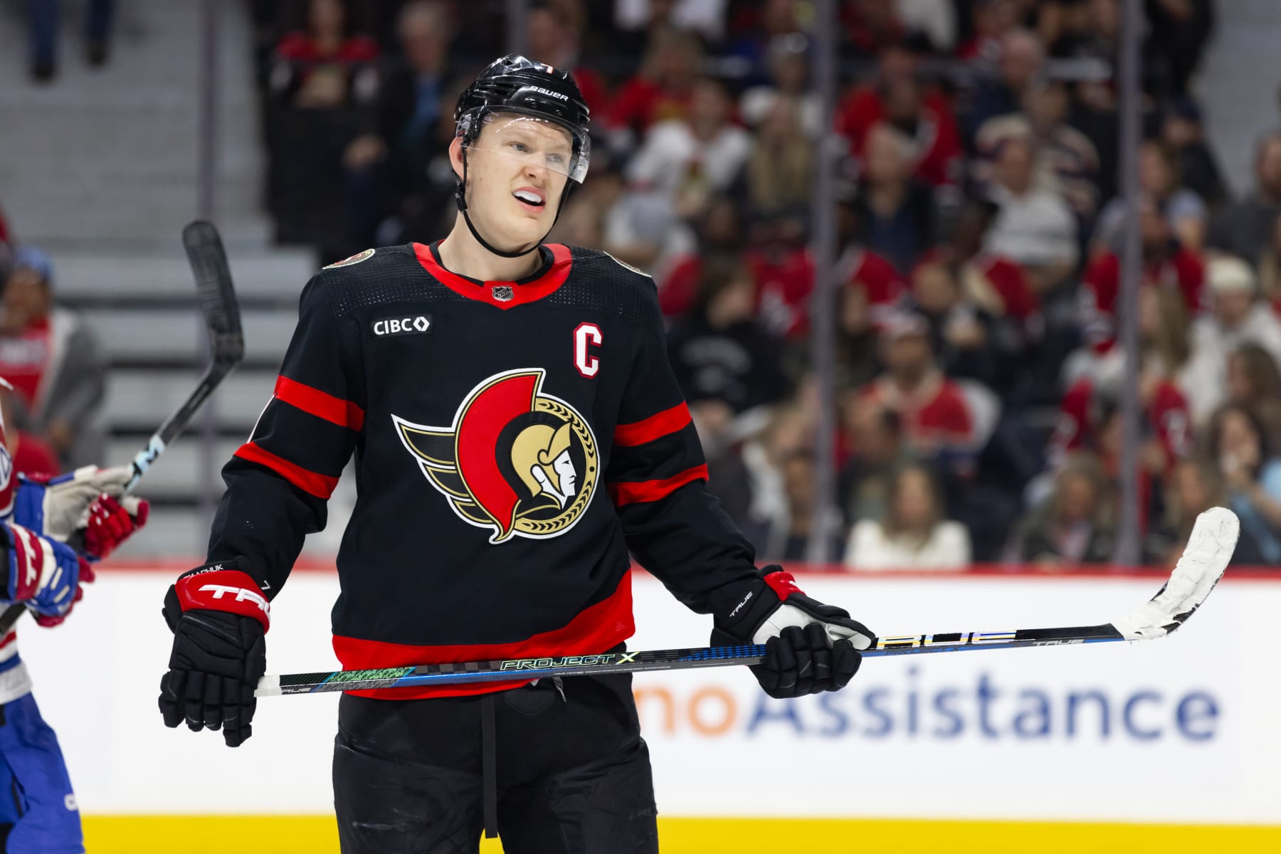 OTTAWA, ON - APRIL 13: Ottawa Senators Left Wing Brady Tkachuk (7) before a face-off during third period National Hockey League action between the Montreal Canadiens and Ottawa Senators on April 13, 2024, at Canadian Tire Centre in Ottawa, ON, Canada. (Photo by Richard A. Whittaker/Icon Sportswire via Getty Images)