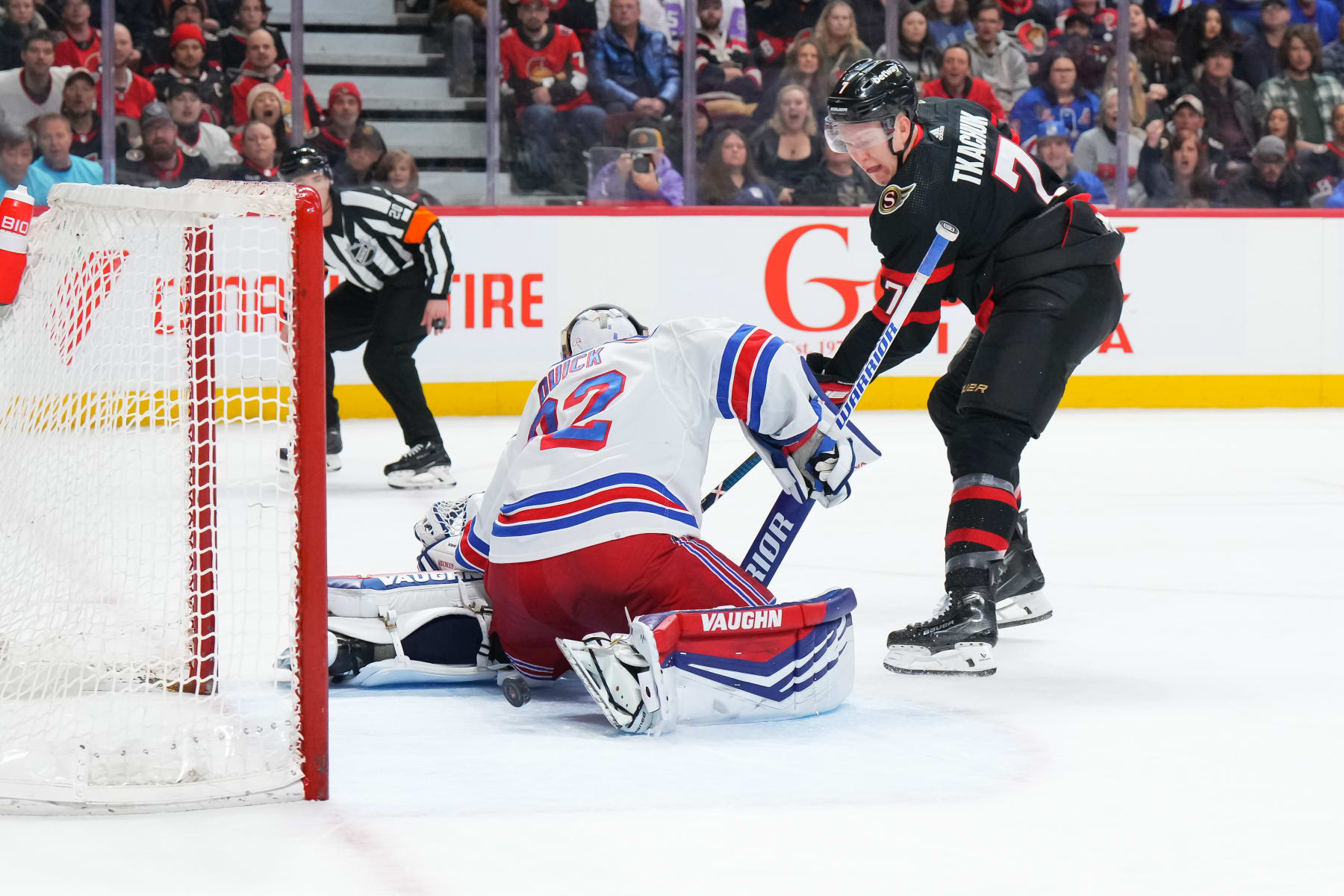 OTTAWA, CANADA - JANUARY 27:  Brady Tkachuk #7 of the Ottawa Senators backhands the puck under Jonathan Quick #32 of the New York Rangers, scoring a first period goal at Canadian Tire Centre on January 27, 2024 in Ottawa, Ontario, Canada.  (Photo by André Ringuette/NHLI via Getty Images)