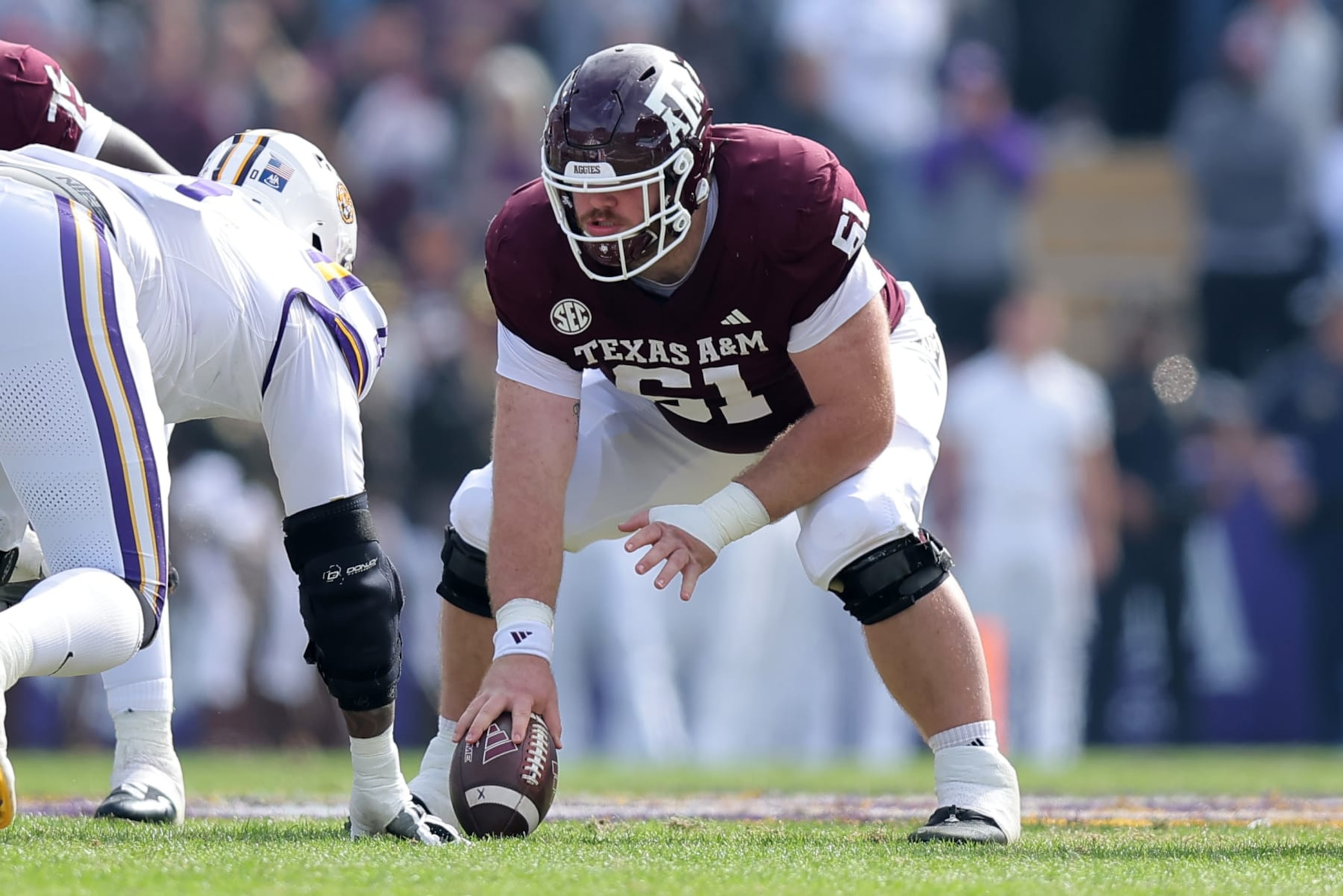 BATON ROUGE, LOUISIANA - NOVEMBER 25: Bryce Foster #61 of the Texas A&M Aggies in action against the LSU Tigers during a game at Tiger Stadium on November 25, 2023 in Baton Rouge, Louisiana. (Photo by Jonathan Bachman/Getty Images)