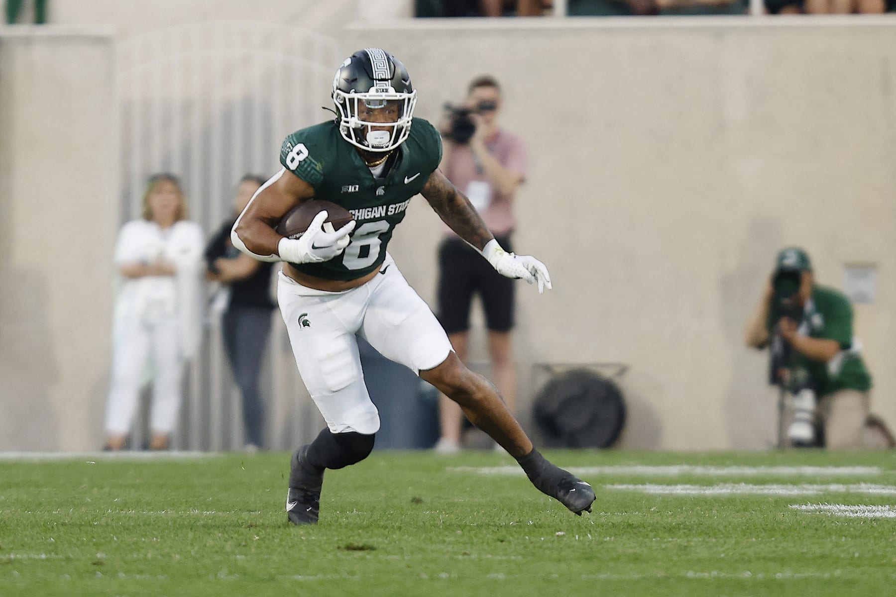 EAST LANSING, MICHIGAN - SEPTEMBER 01: Jalen Berger #8 of the Michigan State Spartans runs up the field in the second quarter of a game against the Central Michigan Chippewas at Spartan Stadium on September 01, 2023 in East Lansing, Michigan. (Photo by Mike Mulholland/Getty Images)