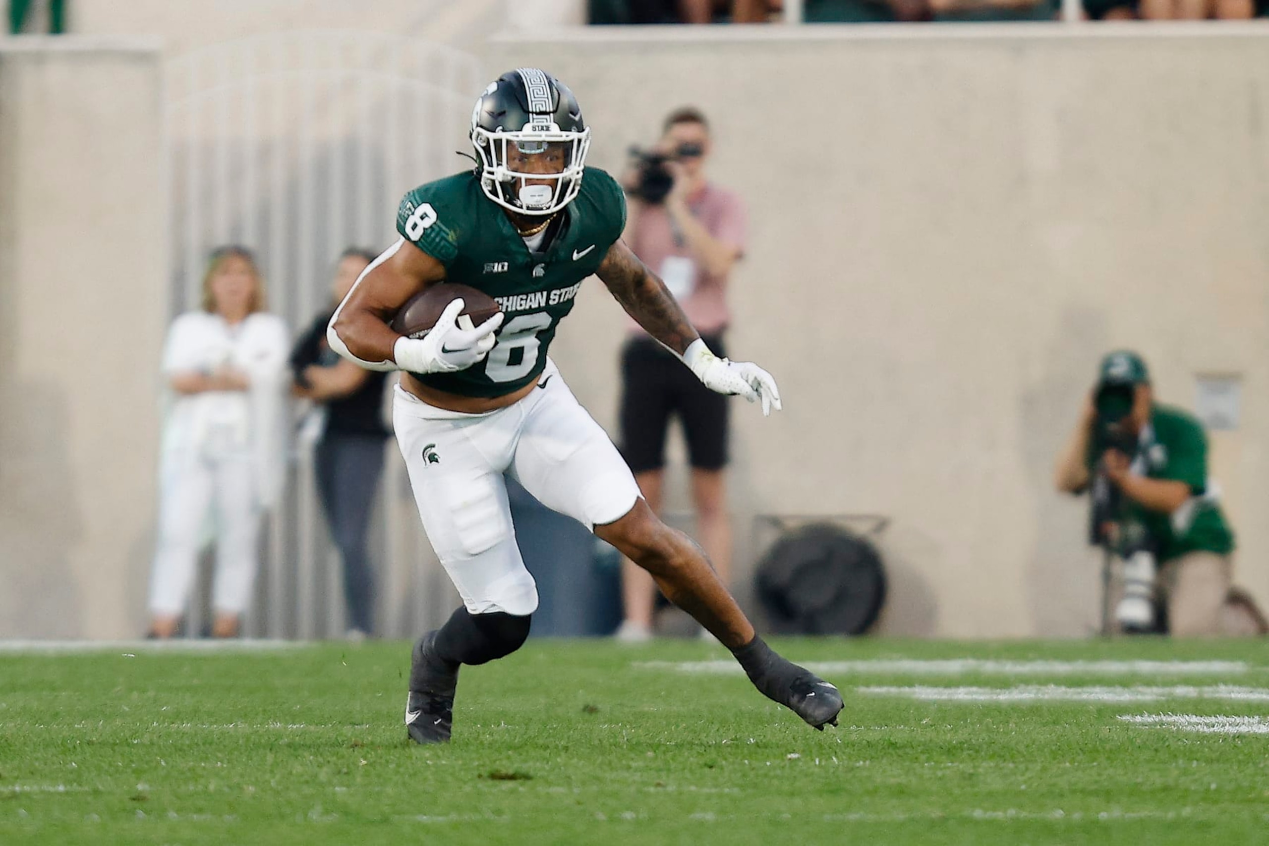 EAST LANSING, MICHIGAN - SEPTEMBER 01: Jalen Berger #8 of the Michigan State Spartans runs up the field in the second quarter of a game against the Central Michigan Chippewas at Spartan Stadium on September 01, 2023 in East Lansing, Michigan. (Photo by Mike Mulholland/Getty Images)