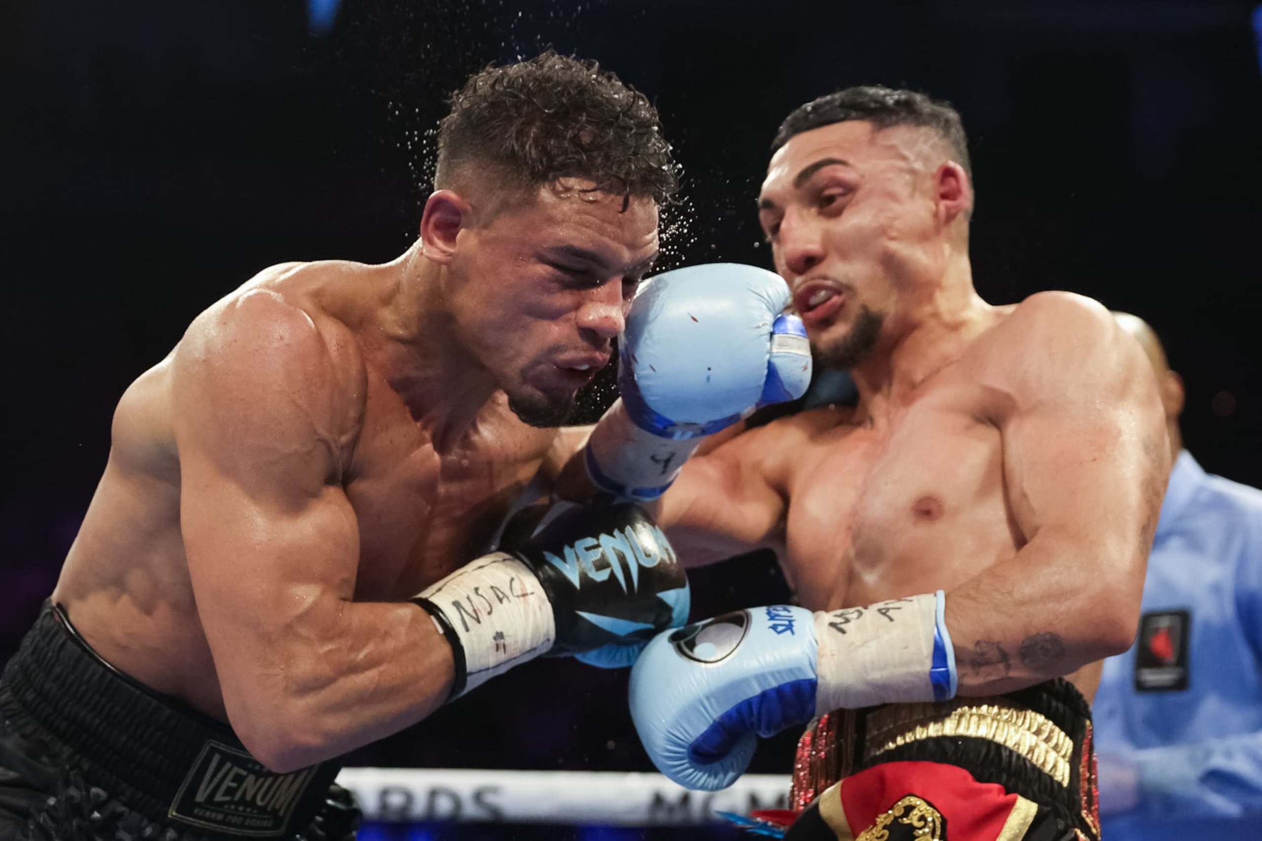 LAS VEGAS, NEVADA - FEBRUARY 08: Teofimo Lopez exchanges punches with Jamaine Ortiz for the WBO junior welterweight title at Michelob ULTRA Arena on February 08, 2024 in Las Vegas, Nevada. (Photo by Jamie Squire/Getty Images) LAS VEGAS, NEVADA - FEBRUARY 08: Teofimo Lopez exchanges punches with Jamaine Ortiz for the WBO junior welterweight title at Michelob ULTRA Arena on February 08, 2024 in Las Vegas, Nevada. (Photo by Jamie Squire/Getty Images)