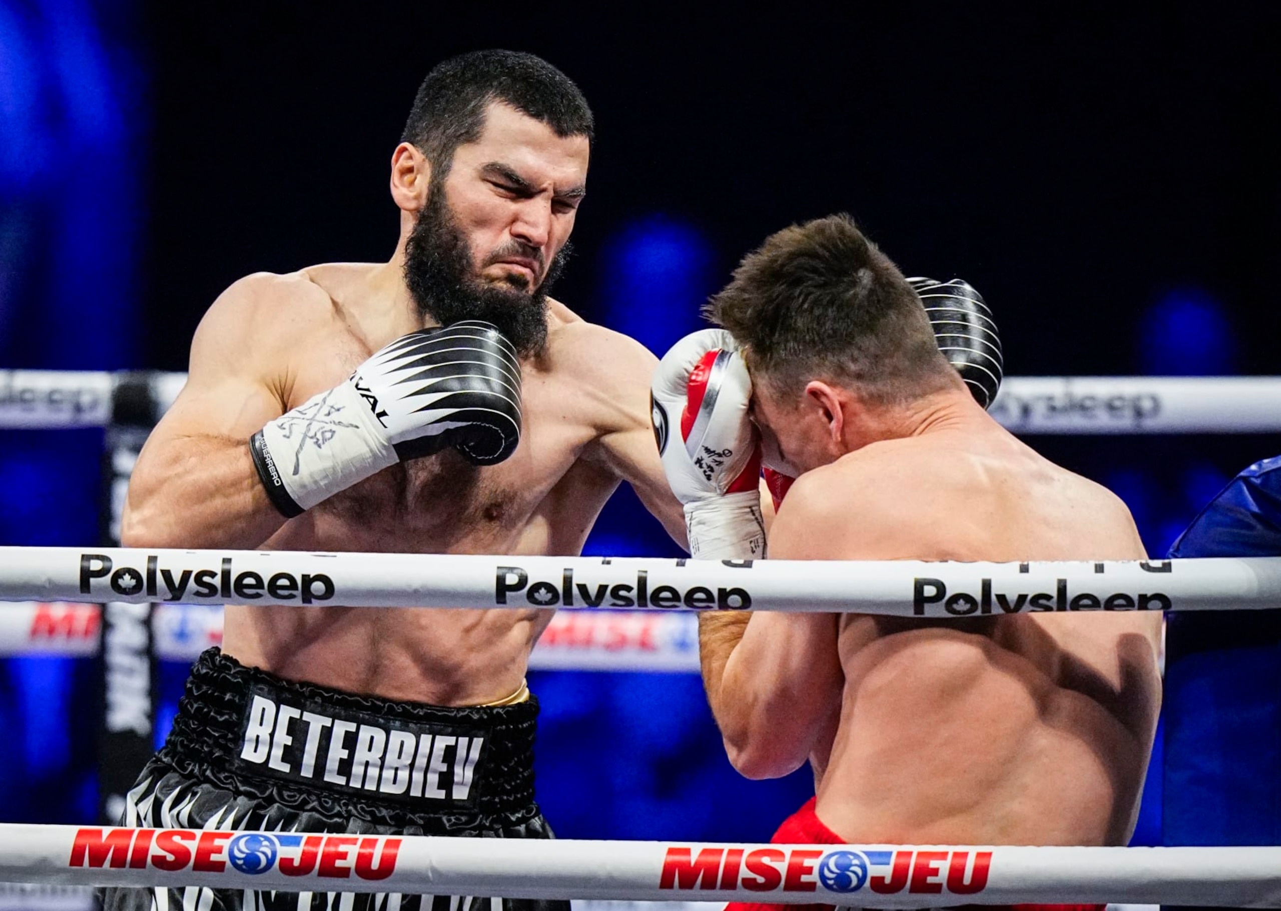 QUEBEC CITY, CANADA - JANUARY 13: Artur Beterbiev of Canada punches Callum Smith of the United Kingdom during their WBC, IBF and WBO light-heavyweight world championship fight at Videotron Centre on January 13, 2024 in Quebec City, Canada. (Photo by Mathieu Belanger/Getty Images) QUEBEC CITY, CANADA - JANUARY 13: Artur Beterbiev of Canada punches Callum Smith of the United Kingdom during their WBC, IBF and WBO light-heavyweight world championship fight at Videotron Centre on January 13, 2024 in Quebec City, Canada. (Photo by Mathieu Belanger/Getty Images)