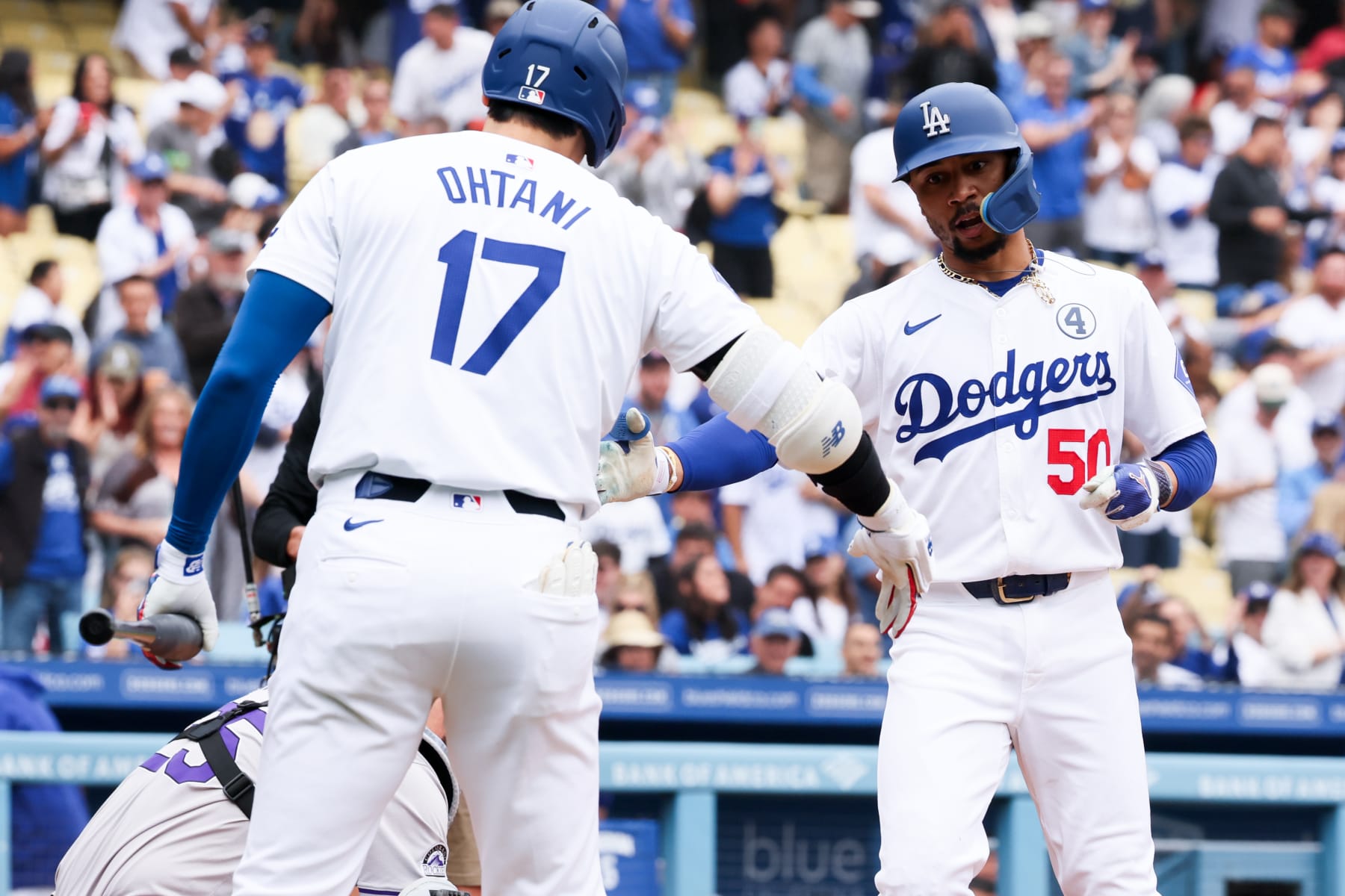 LOS ANGELES, CA - JUNE 02: Dodgers' Mookie Betts, right, celebrates at home plate with Shohei Ohtani after a one-run home run in the first inning against the Colorado Rockies at Dodger Stadium on Sunday, June 2, 2024 in Los Angeles, CA.  (Robert Gauthier / Los Angeles Times via Getty Images)