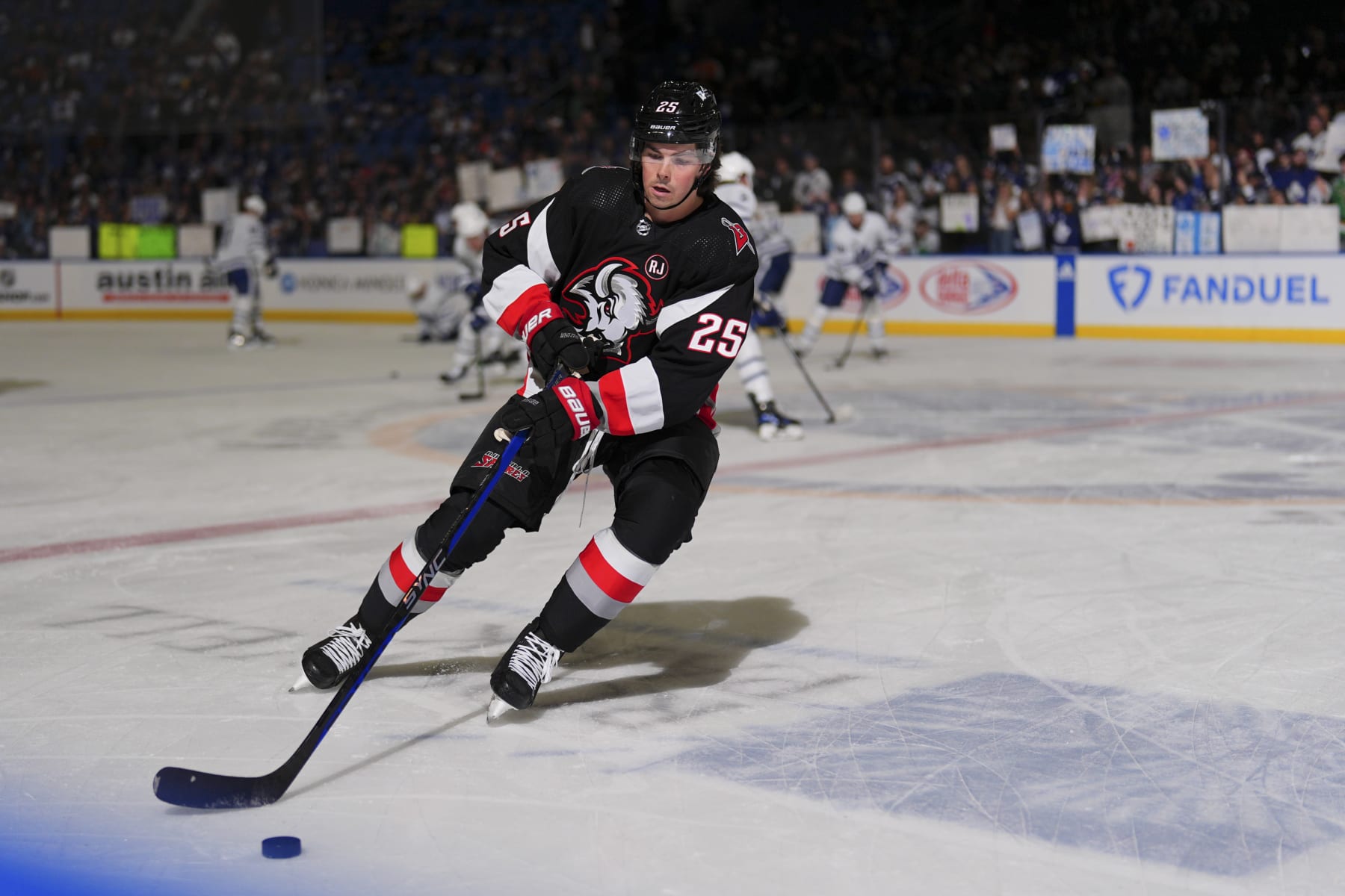 BUFFALO, NEW YORK - MARCH 30: Owen Power #25 of the Buffalo Sabres warms up before the NHL game against the Toronto Maple Leafs on March 30, 2024 at KeyBank Center in Buffalo, New York. (Photo by Ben Ludeman/NHLI via Getty Images)