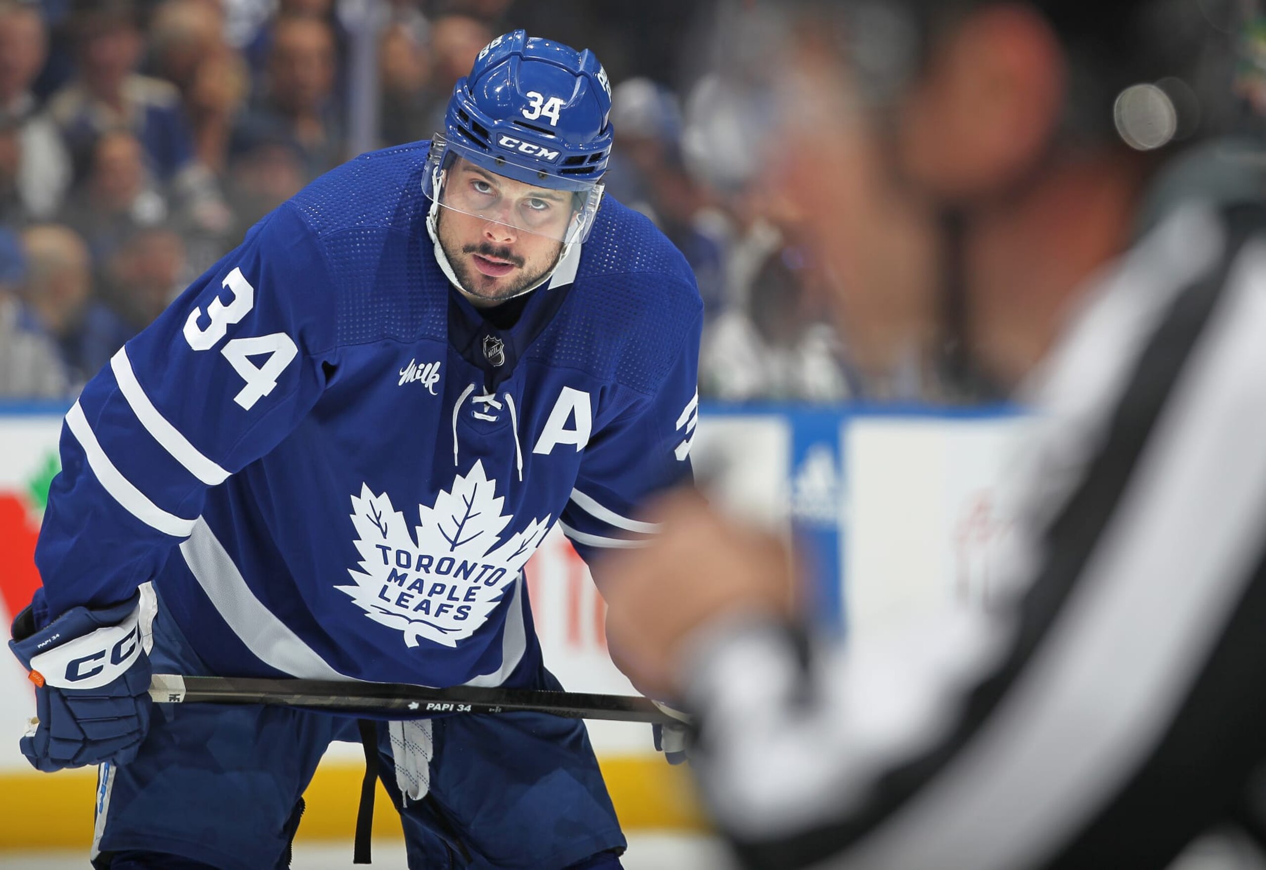 TORONTO, CANADA - APRIL 24:  Auston Matthews #34 of the Toronto Maple Leafs gets set on the powerplay against the Boston Bruins in Game Three of the First Round of the 2024 Stanley Cup Playoffs at Scotiabank Arena on April 24, 2024 in Toronto, Ontario, Canada. The Bruins defeated the Maple Leafs 4-2. (Photo by Claus Andersen/Getty Images)
