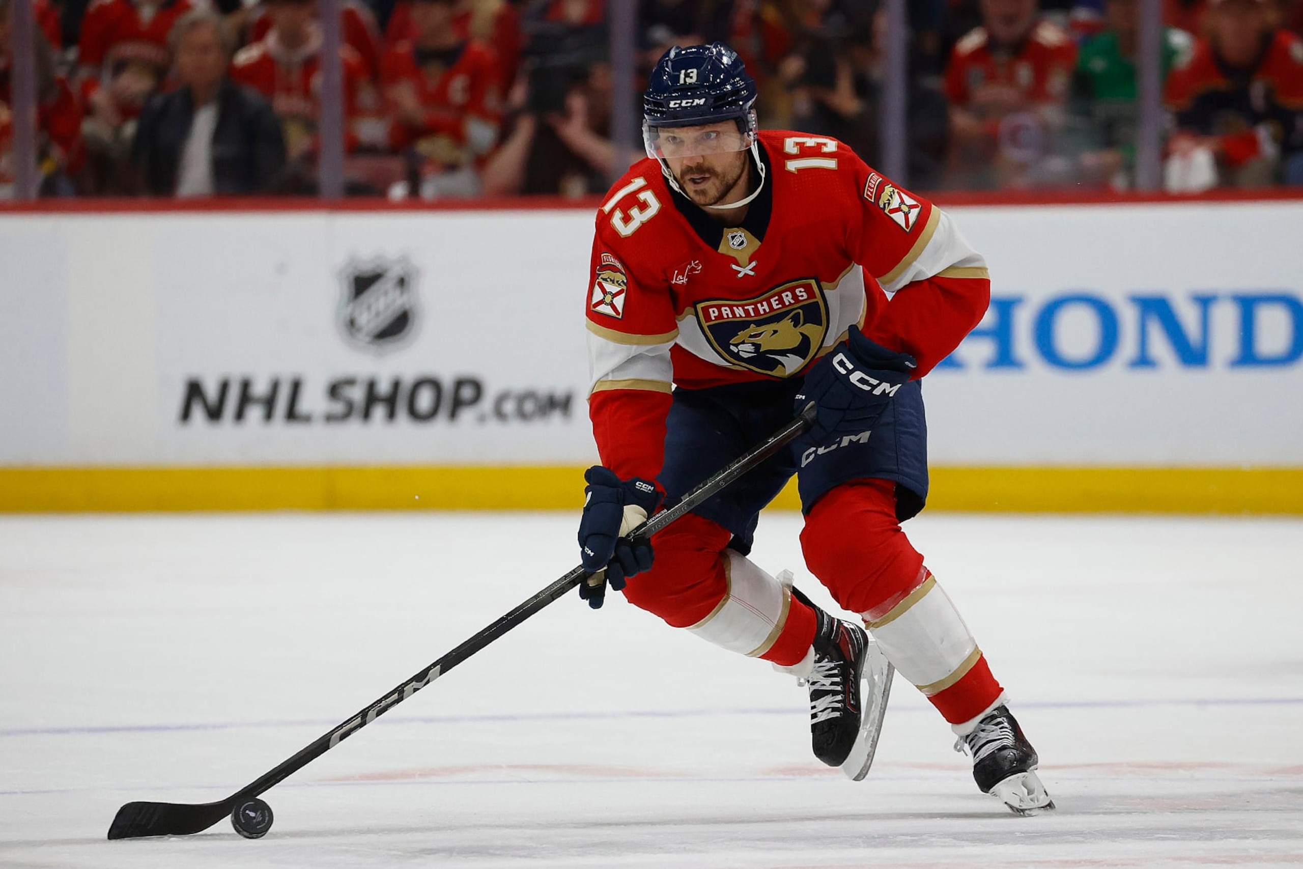 SUNRISE, FLORIDA - MAY 26: Sam Reinhart #13 of the Florida Panthers skates with the puck during the first period against the New York Rangers in Game Three of the Eastern Conference Final at the Amerant Bank Arena on May 26, 2024 in Sunrise, Florida. (Photo by Eliot J. Schechter/NHLI via Getty Images) SUNRISE, FLORIDA - MAY 26: Sam Reinhart #13 of the Florida Panthers skates with the puck during the first period against the New York Rangers in Game Three of the Eastern Conference Final at the Amerant Bank Arena on May 26, 2024 in Sunrise, Florida. (Photo by Eliot J. Schechter/NHLI via Getty Images)