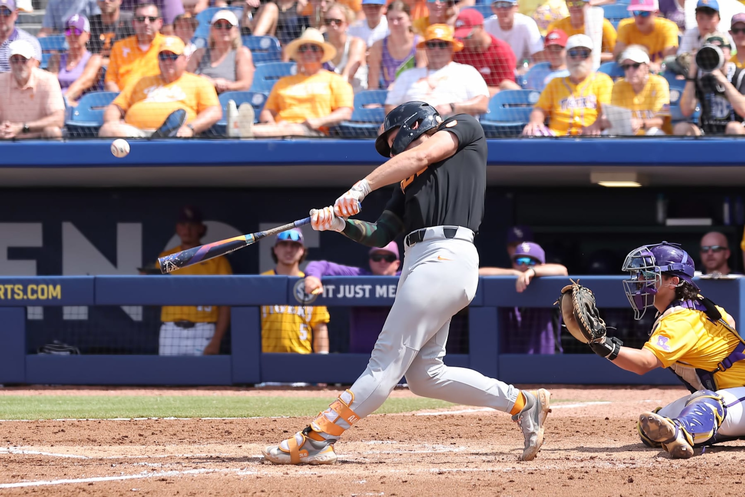 HOOVER, AL - MAY 26: Tennessee Volunteers infielder Billy Amick (11)hits a three run homerun during the 2024 SEC Baseball Tournament championship game between the Tennessee Volunteers and the LSU Tigers on May 26, 2024 at the Hoover Metropolitan Stadium in Hoover, Alabama. (Photo by Michael Wade/Icon Sportswire via Getty Images) HOOVER, AL - MAY 26: Tennessee Volunteers infielder Billy Amick (11)hits a three run homerun during the 2024 SEC Baseball Tournament championship game between the Tennessee Volunteers and the LSU Tigers on May 26, 2024 at the Hoover Metropolitan Stadium in Hoover, Alabama. (Photo by Michael Wade/Icon Sportswire via Getty Images)