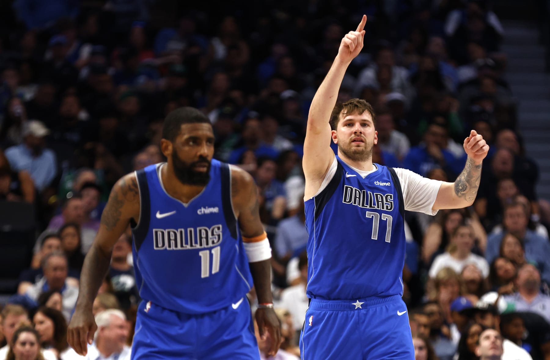 DALLAS, TX - APRIL 4: Luka Doncic #77 of the Dallas Mavericks and Kyrie Irving #11 of the Dallas Mavericks react against the Atlanta Hawks in the second half at American Airlines Center on April 4, 2024 in Dallas, Texas. NOTE TO USER: User expressly acknowledges and agrees that, by downloading and or using this photograph, User is consenting to the terms and conditions of the Getty Images License Agreement. (Photo by Ron Jenkins/Getty Images)