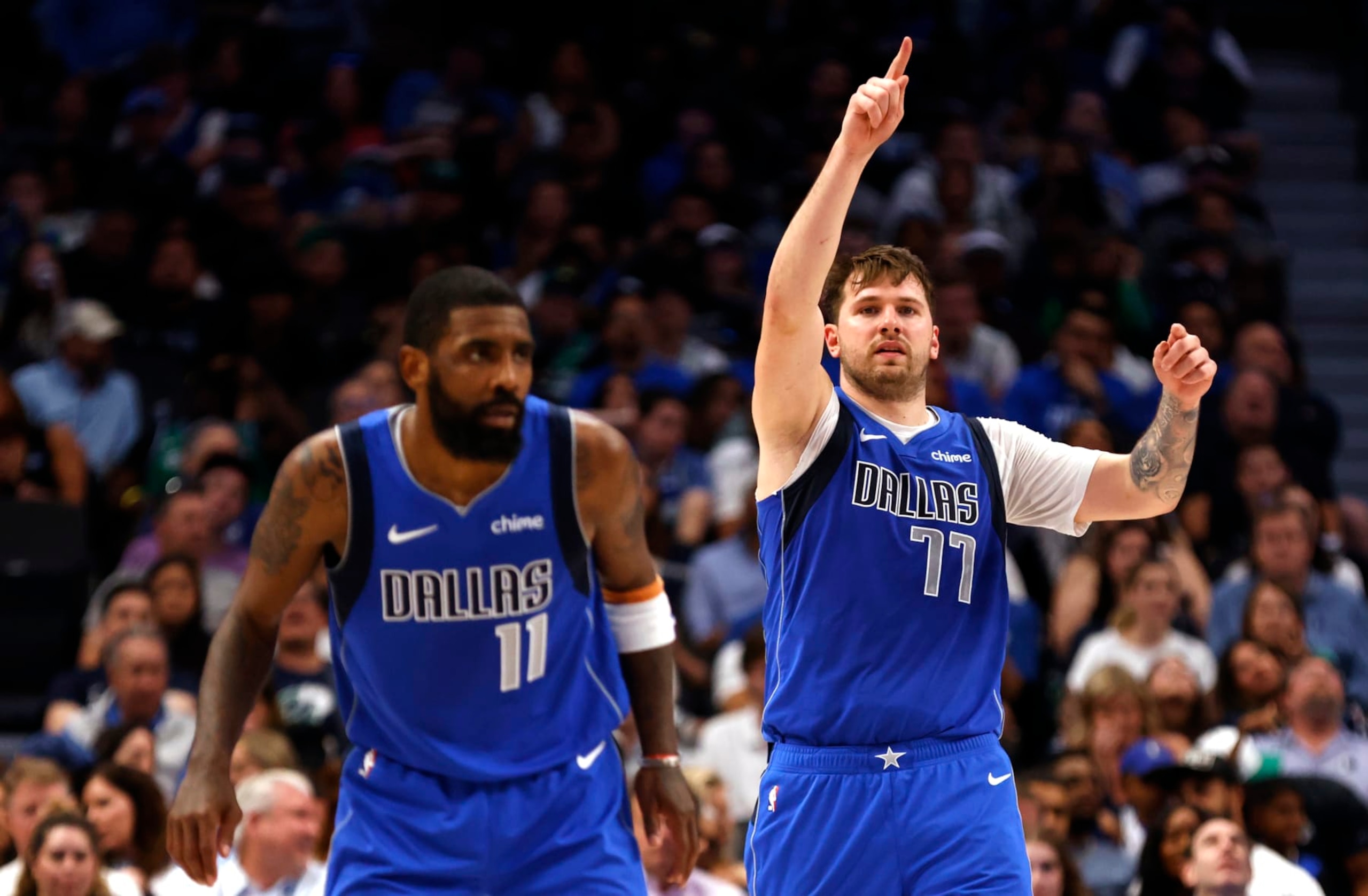 DALLAS, TX - APRIL 4: Luka Doncic #77 of the Dallas Mavericks and Kyrie Irving #11 of the Dallas Mavericks react against the Atlanta Hawks in the second half at American Airlines Center on April 4, 2024 in Dallas, Texas. NOTE TO USER: User expressly acknowledges and agrees that, by downloading and or using this photograph, User is consenting to the terms and conditions of the Getty Images License Agreement. (Photo by Ron Jenkins/Getty Images)