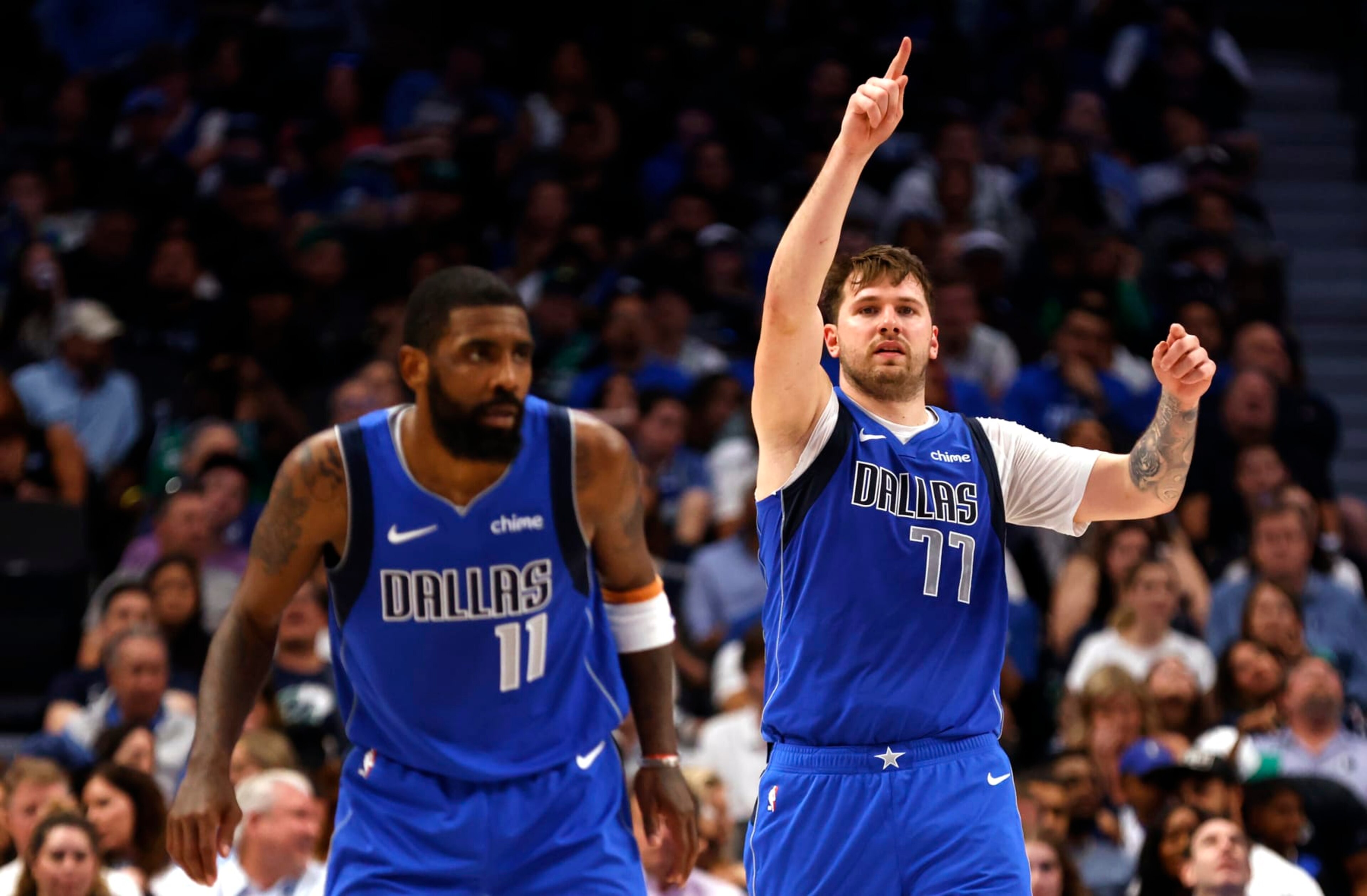 DALLAS, TX - APRIL 4: Luka Doncic #77 of the Dallas Mavericks and Kyrie Irving #11 of the Dallas Mavericks react against the Atlanta Hawks in the second half at American Airlines Center on April 4, 2024 in Dallas, Texas. NOTE TO USER: User expressly acknowledges and agrees that, by downloading and or using this photograph, User is consenting to the terms and conditions of the Getty Images License Agreement. (Photo by Ron Jenkins/Getty Images)
