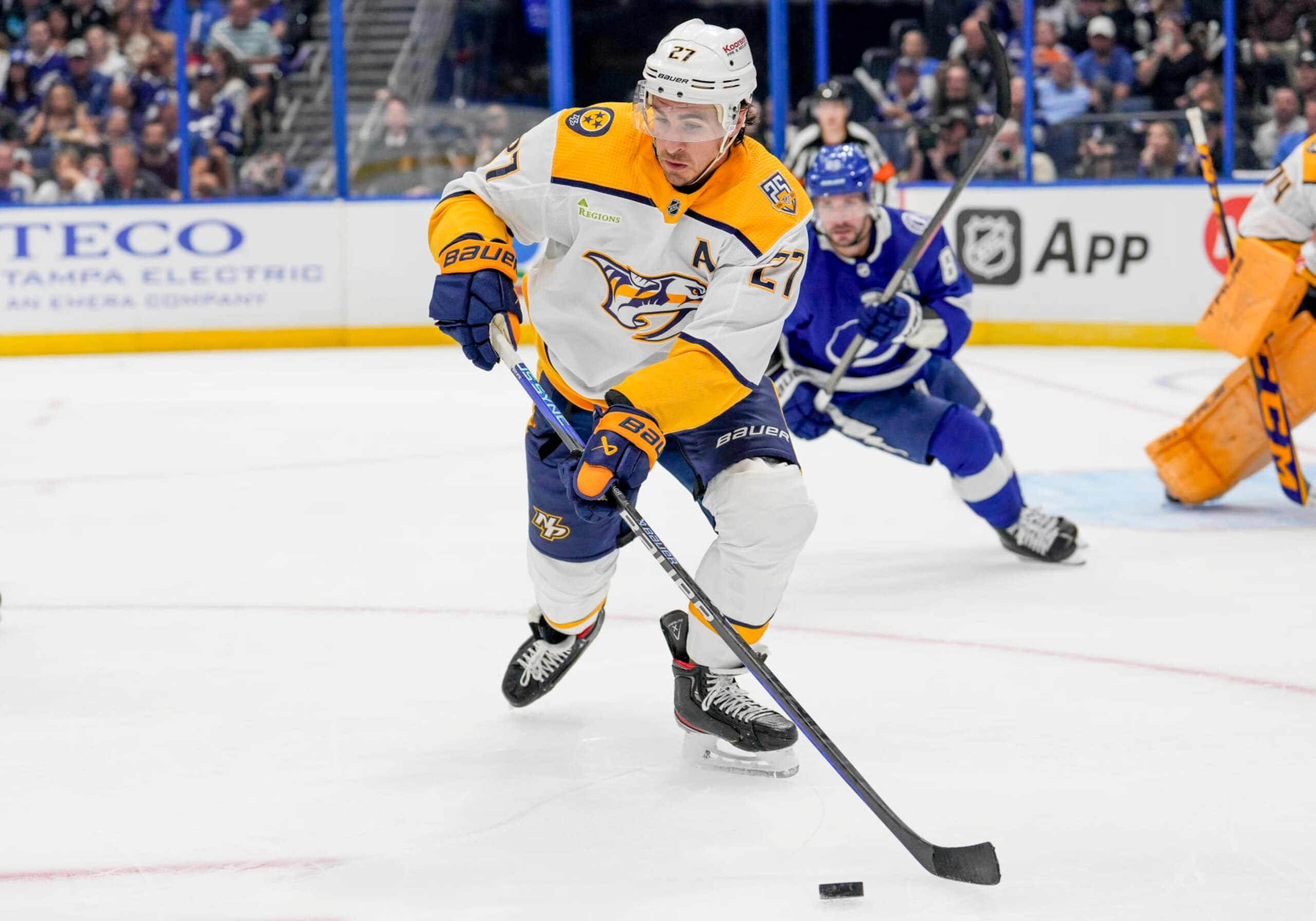 TAMPA, FL - OCTOBER 10: Nashville Predators defenseman Ryan McDonagh (27) clears the puck during the NHL Hockey match between the Tampa Bay Lightning andNashville Predators on October 10th, 2023 at Amalie Arena in Tampa, FL. (Photo by Andrew Bershaw/Icon Sportswire via Getty Images)