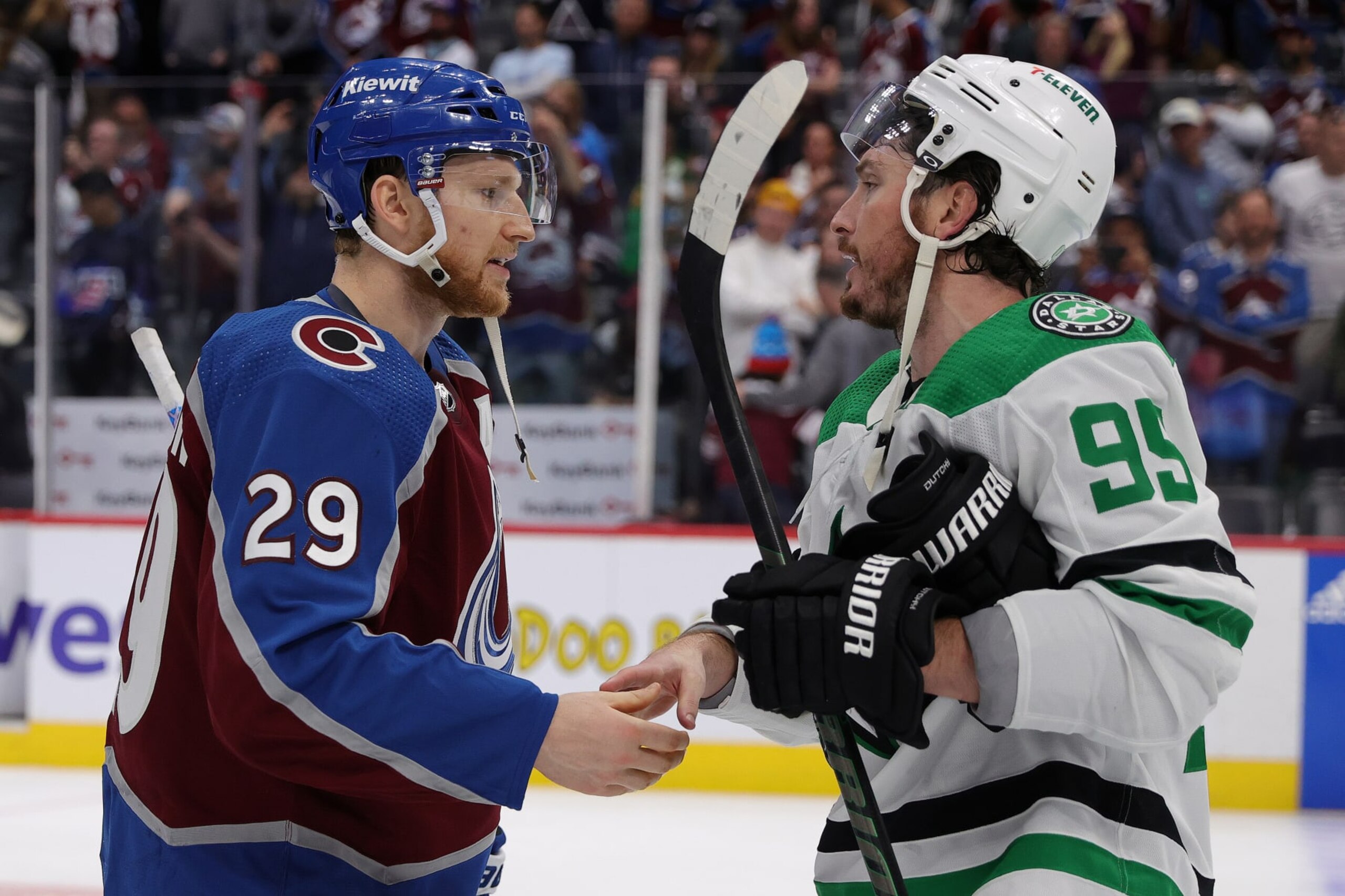 DENVER, COLORADO - MAY 17: Nathan MacKinnon #29 of the Colorado Avalanche shakes hands with Matt Duchene #95 of the Dallas Stars after Game Six of the Second Round of the 2024 Stanley Cup Playoffs at Ball Arena on May 17, 2024 in Denver, Colorado.  (Photo by Michael Martin/NHLI via Getty Images)