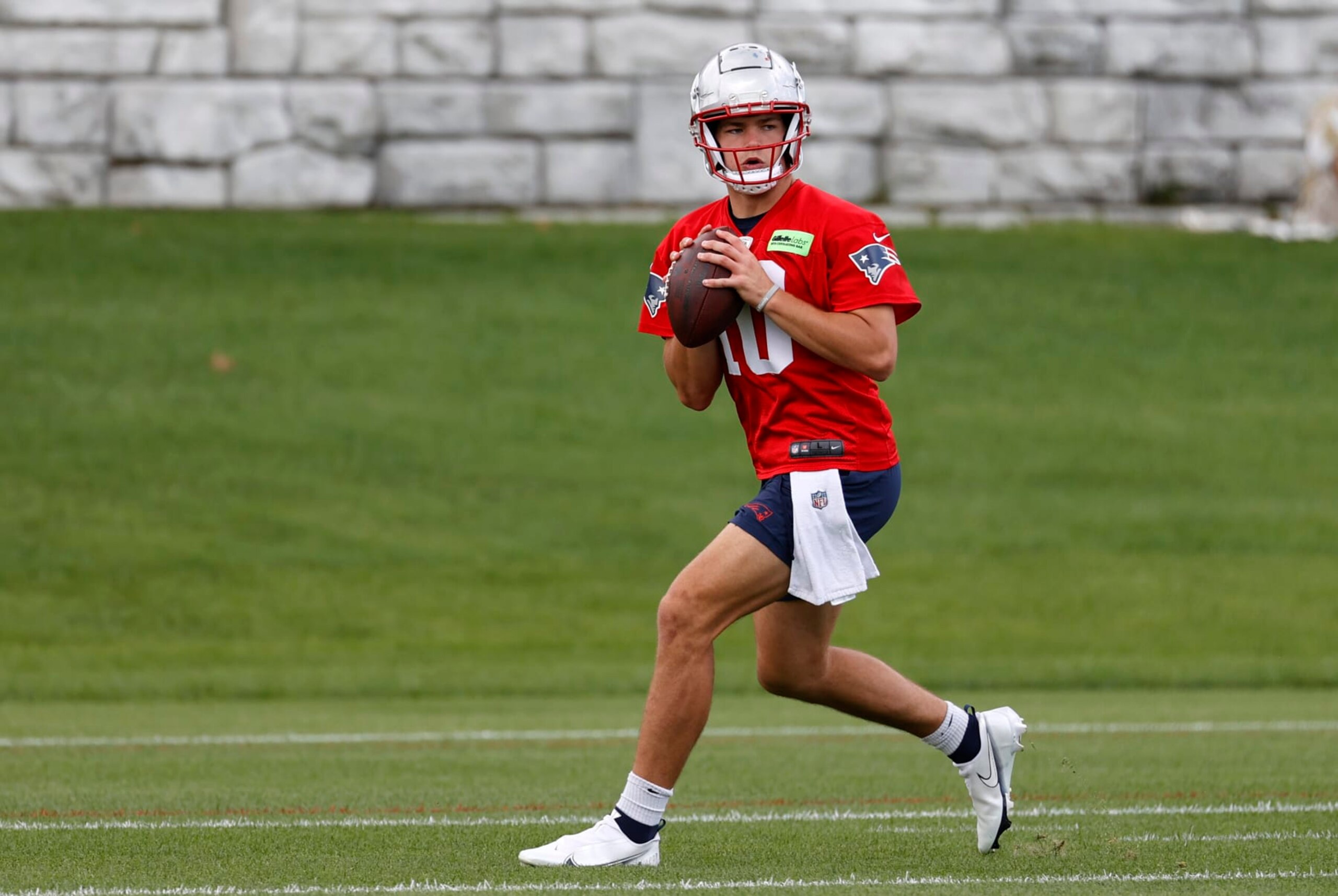 FOXBOROUGH, MA - MAY 29: New England Patriots quarterback Drake Maye (10) runs a drill during New England Patriots Optional Team Activities on May 29, 2024, at Gillette Stadium in Foxborough, Massachusetts. (Photo by Fred Kfoury III/Icon Sportswire via Getty Images)