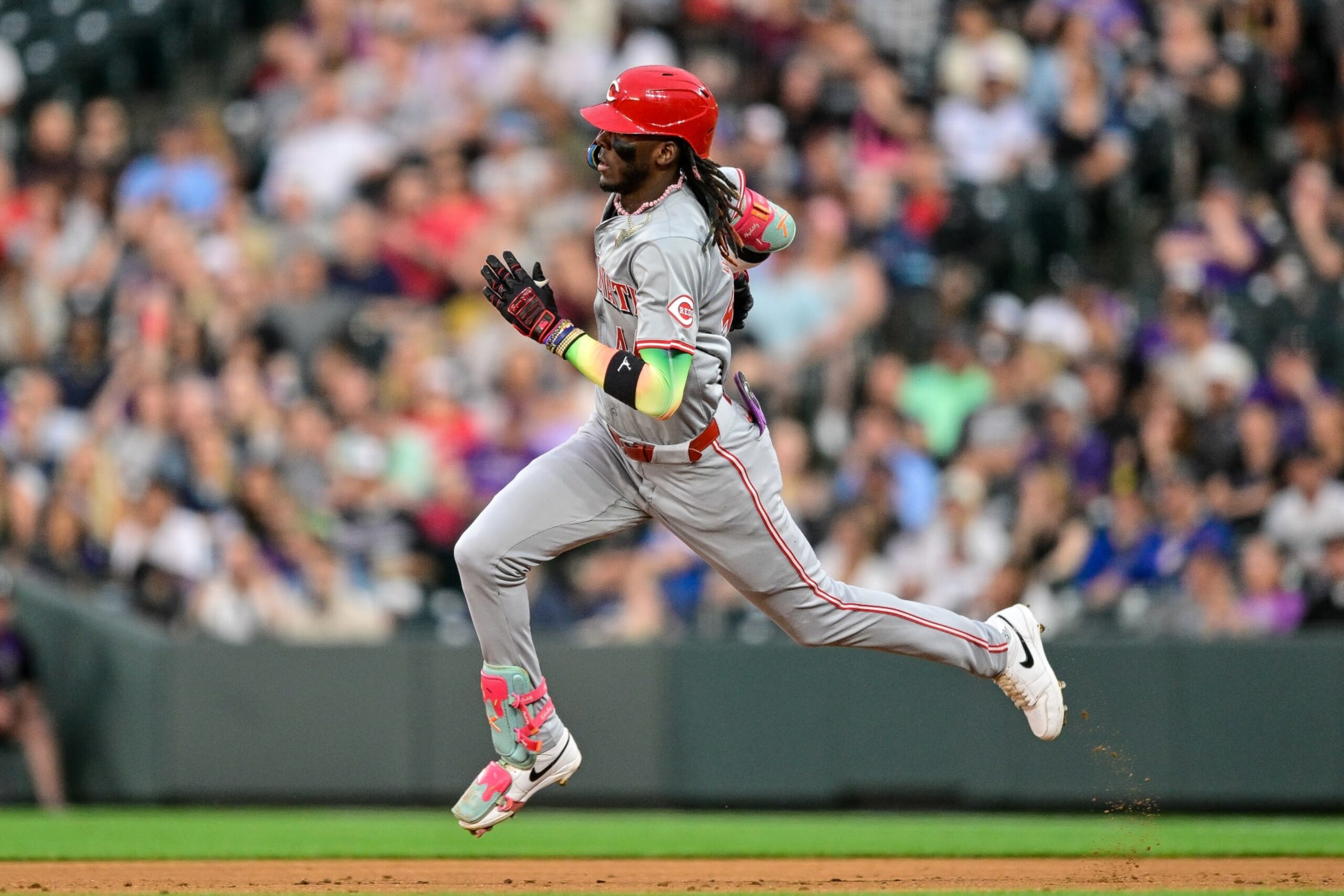 DENVER, CO - JUNE 03: Cincinnati Reds shortstop Elly De La Cruz (44) runs after hitting a third inning RBI double during a game between the Cincinnati Reds and the Colorado Rockies at Coors Field on June 3, 2024 in Denver, Colorado. (Photo by Dustin Bradford/Icon Sportswire via Getty Images)