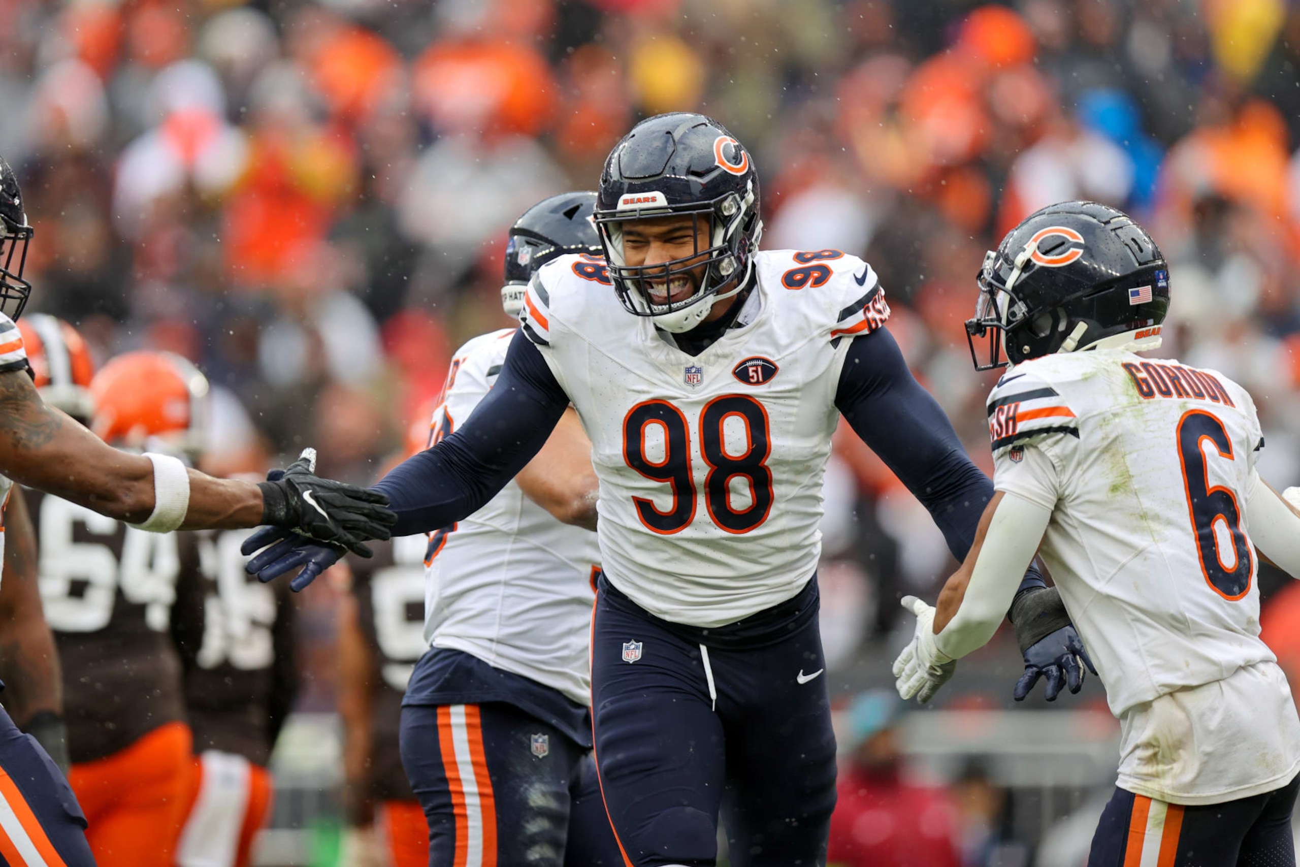 CLEVELAND, OH - DECEMBER 17: Chicago Bears defensive end Montez Sweat (98) celebrates after making a sack during the third quarter of the National Football League game between the Chicago Bears and Cleveland Browns on December 17, 2023, at Cleveland Browns Stadium in Cleveland, OH. (Photo by Frank Jansky/Icon Sportswire via Getty Images)