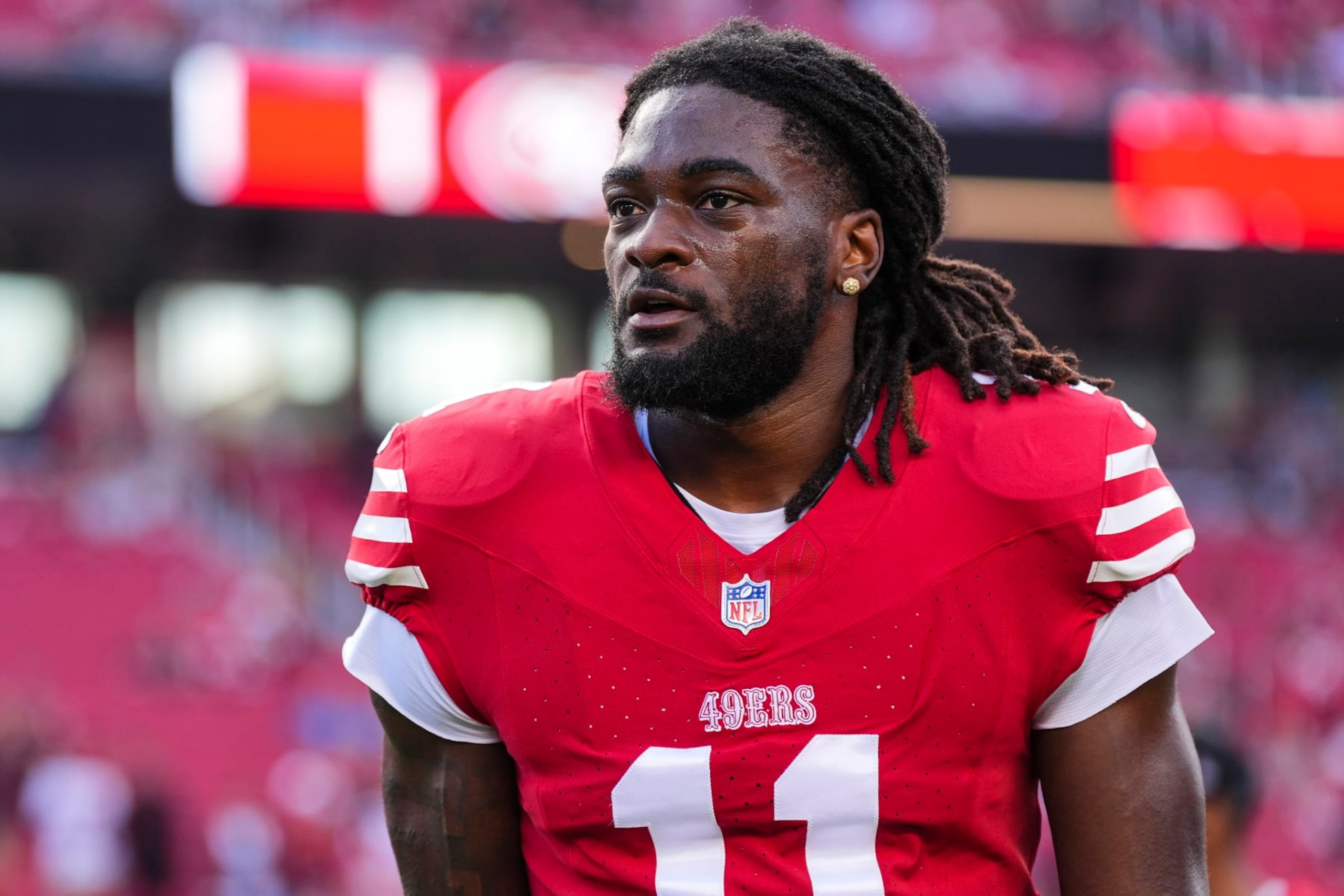 SANTA CLARA, CA - JANUARY 28: Brandon Aiyuk #11 of the San Francisco 49ers looks on from the field prior to the NFC Championship NFL football game against the Detroit Lions at Levi's Stadium on January 28, 2024 in Santa Clara, California. (Photo by Cooper Neill/Getty Images) SANTA CLARA, CA - JANUARY 28: Brandon Aiyuk #11 of the San Francisco 49ers looks on from the field prior to the NFC Championship NFL football game against the Detroit Lions at Levi's Stadium on January 28, 2024 in Santa Clara, California. (Photo by Cooper Neill/Getty Images)